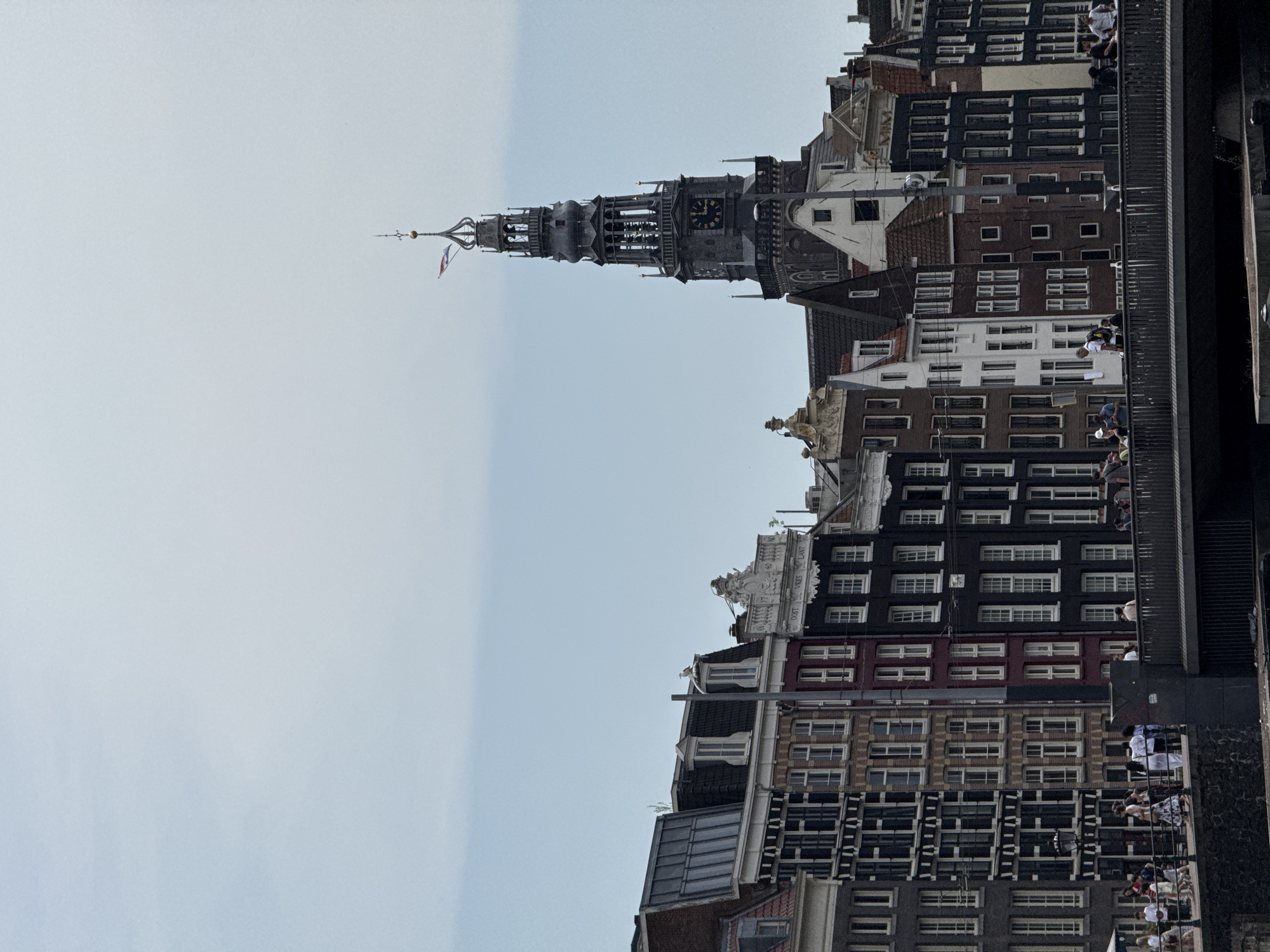 Canals, barges, and the basilica near Amsterdam Centraal