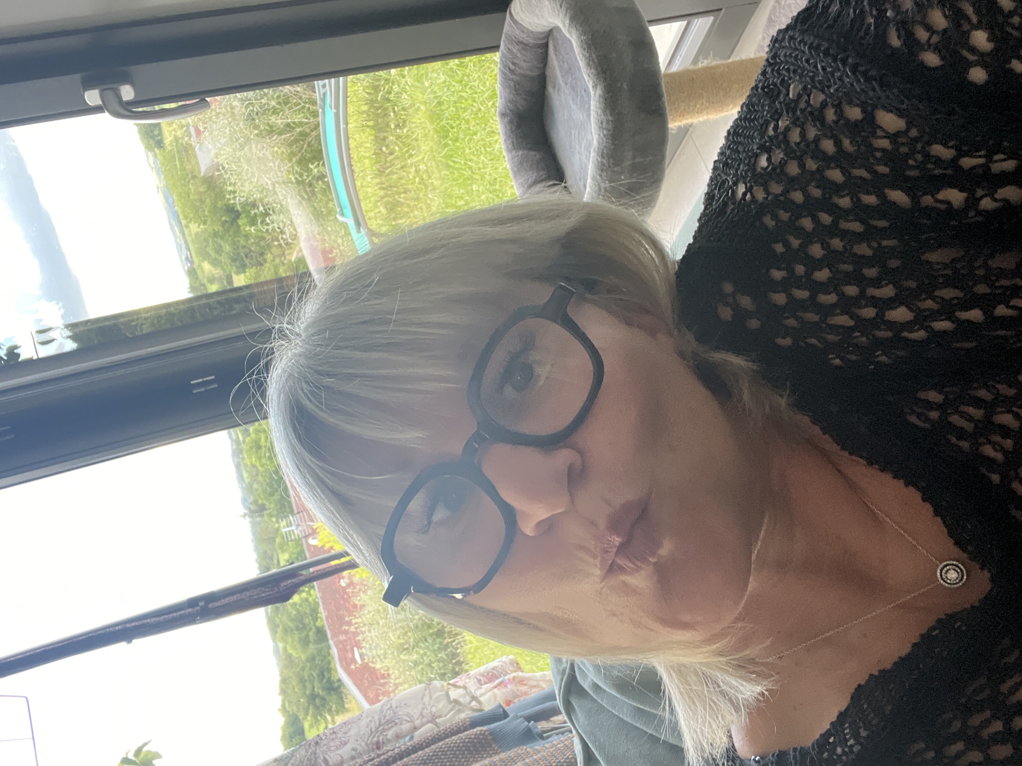 Woman takes indoor selfies in Chambœuf, France