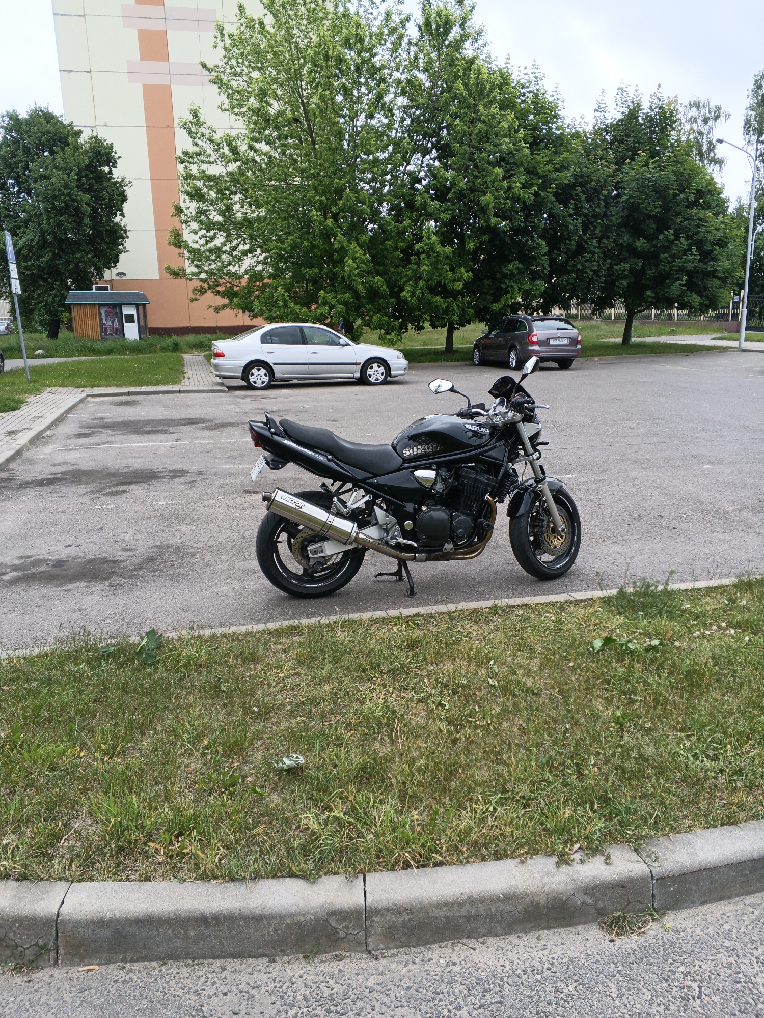 Motorcycle parked on roadside in Baranavichy, Belarus morning