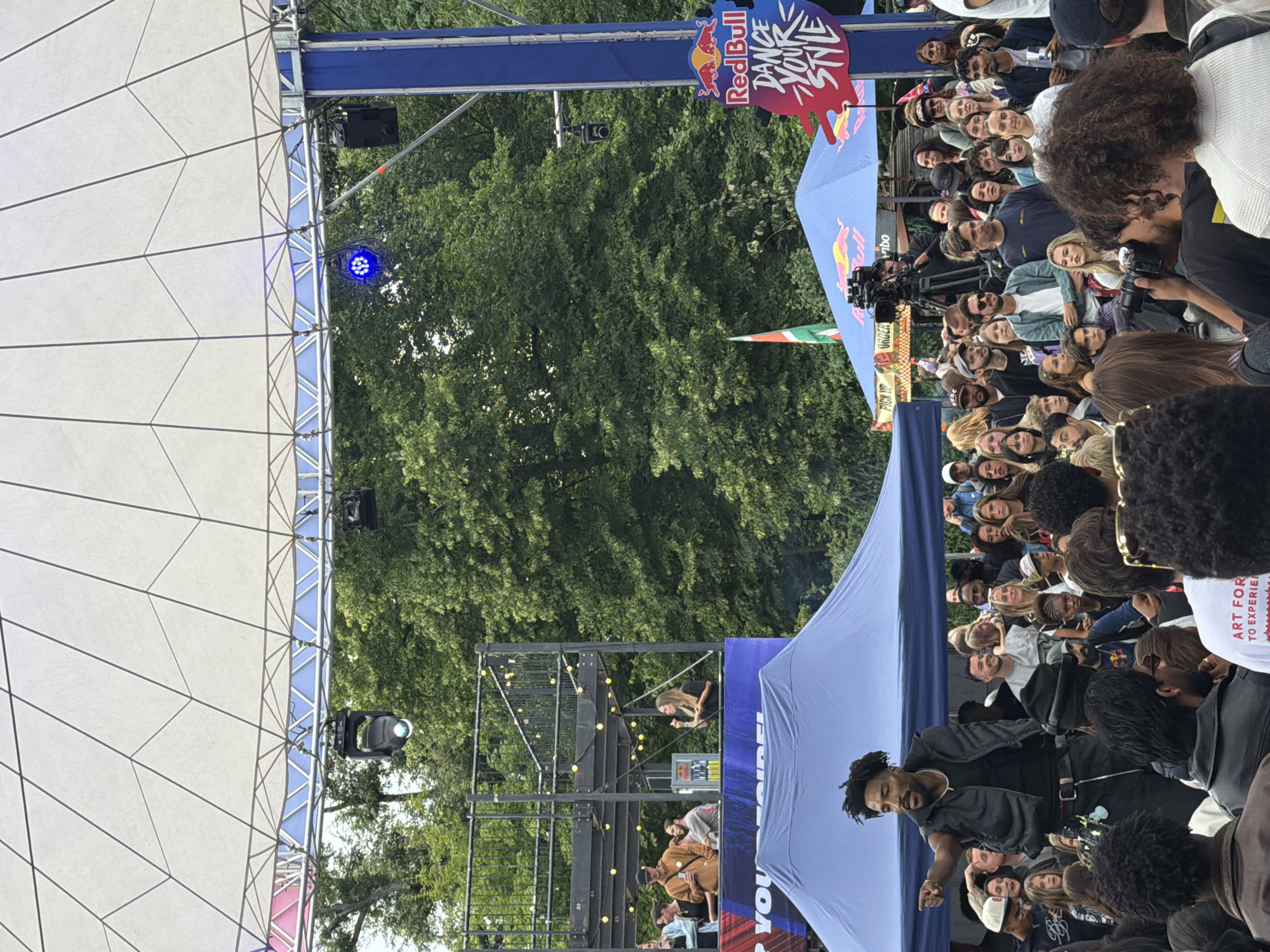 Live performance event draws a crowd under Amsterdam canopy