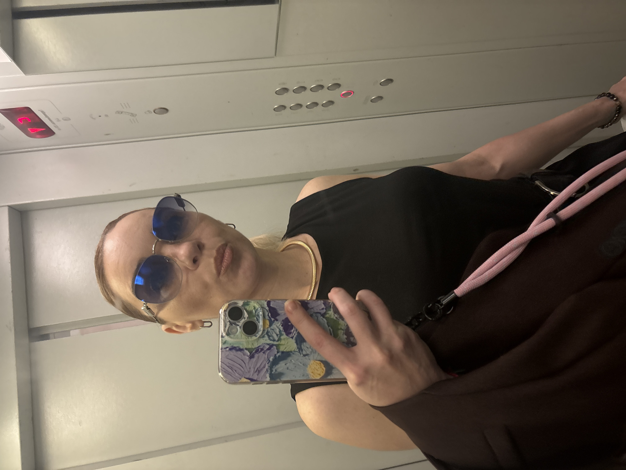 Mirror selfies and street shots, same outfit, multiple locations.