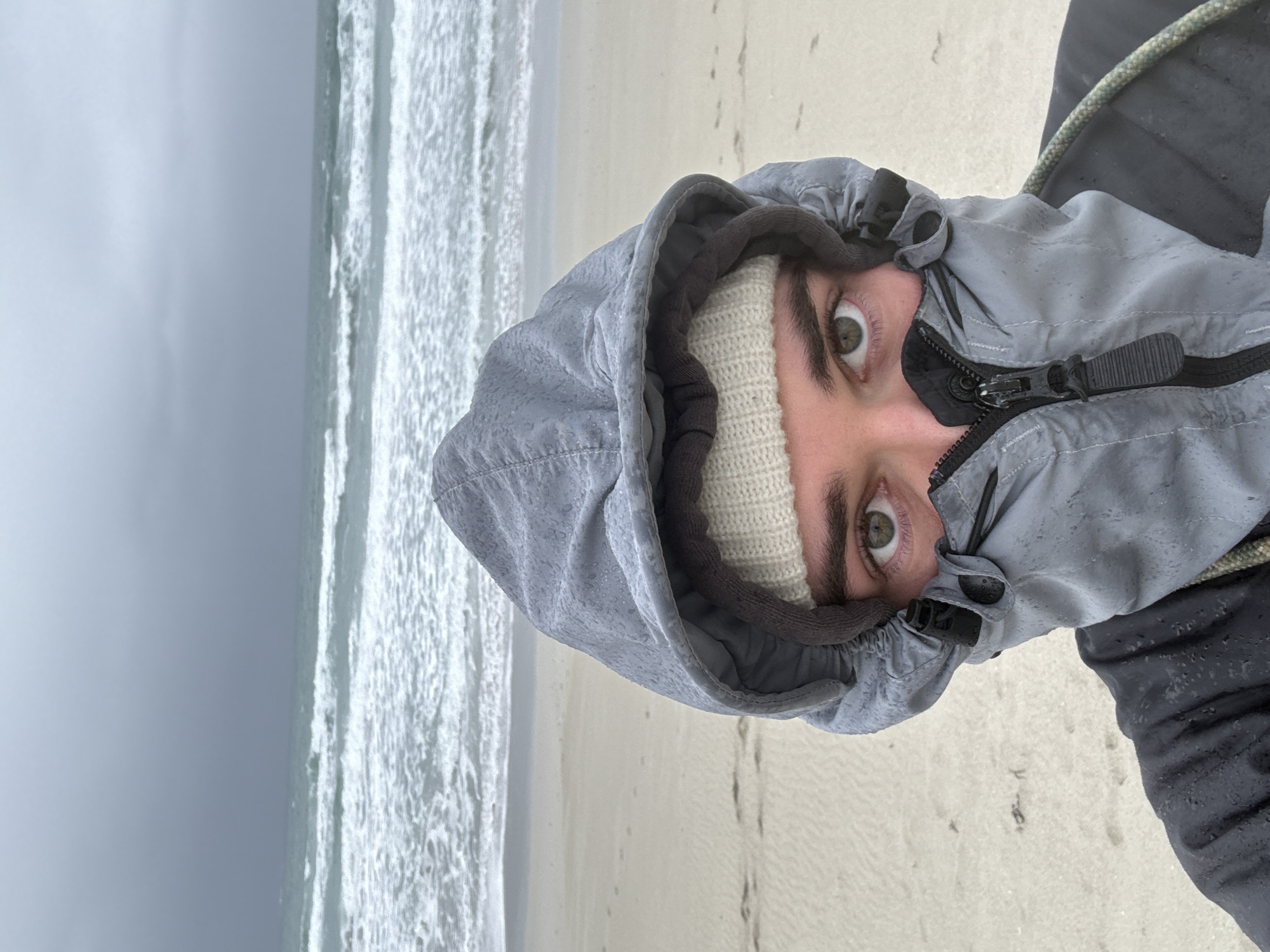 Coastal community daily life documented amid overcast spring morning