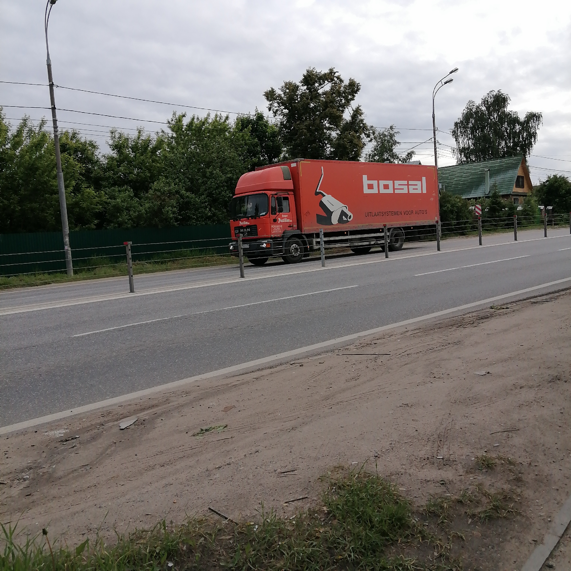 Various commercial and passenger vehicles observed near tire shop