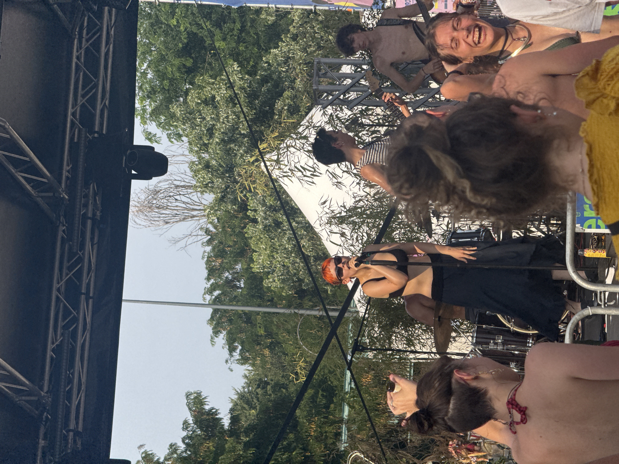 Live band performs at sunny outdoor festival in Milan