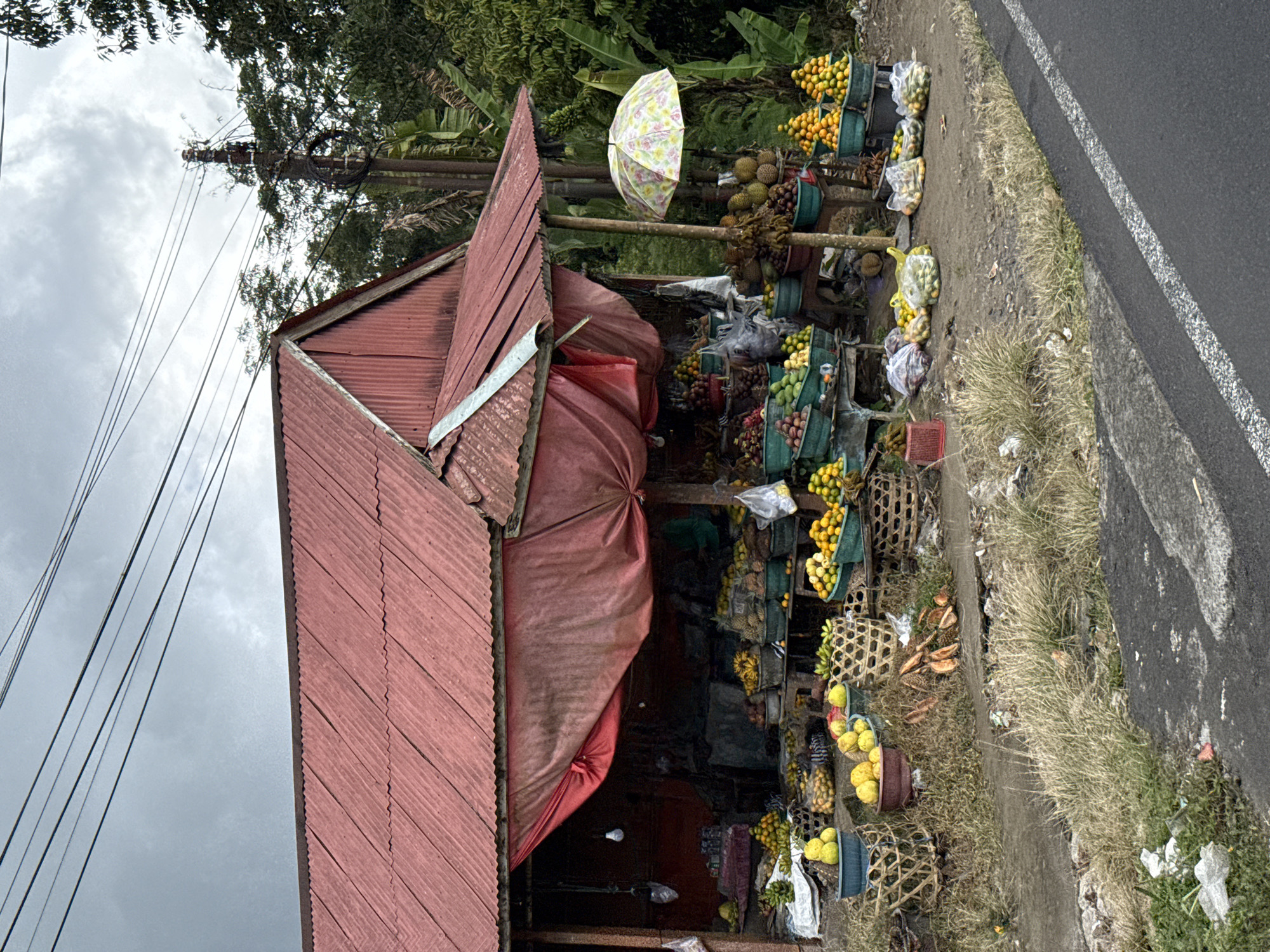 Fruit stand operates in Kintamani, Indonesia