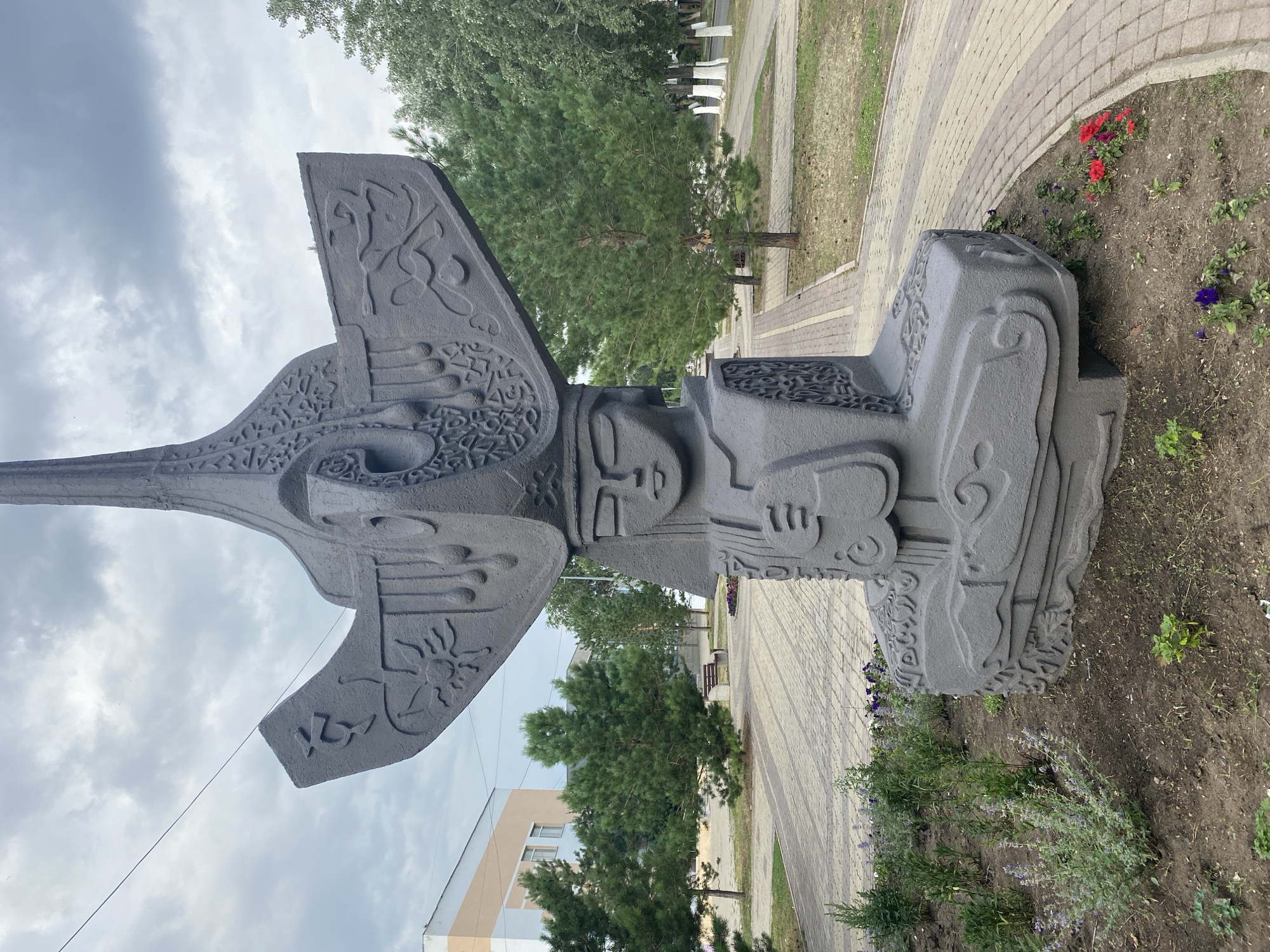 Patterned sculpture of a seated musician in Karaganda, Kazakhstan