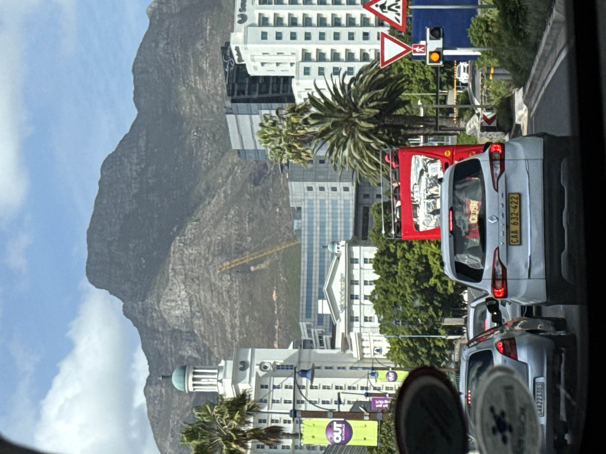 Vehicle passenger documents Cape Town street scene with Table Mountain