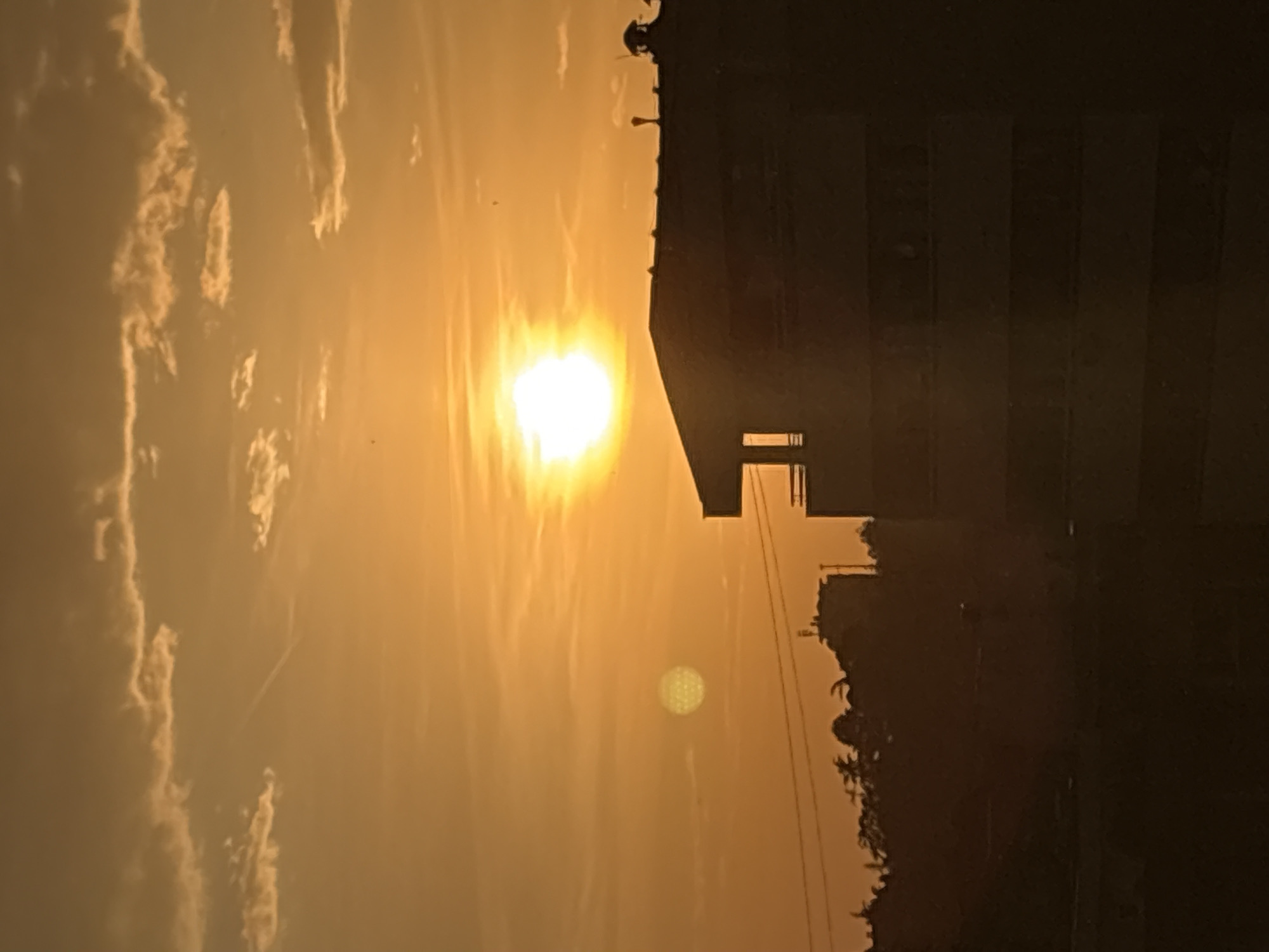 Sunset observed across Belgrade cityscape during evening hours