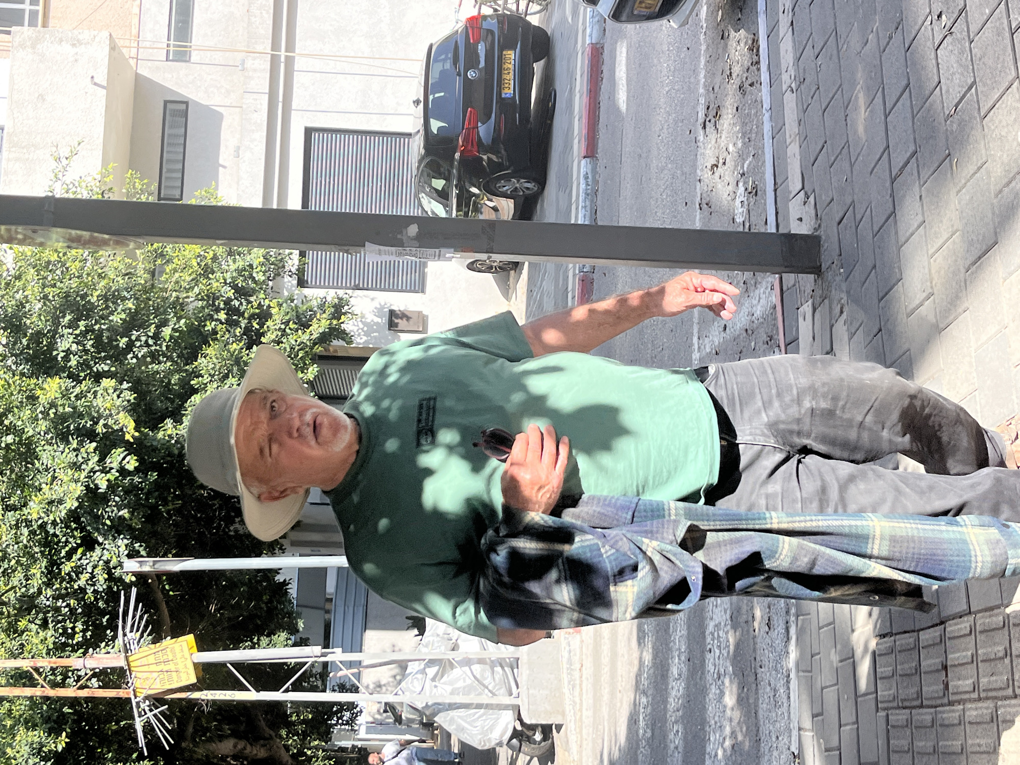 Casual street life documented across Tel Aviv neighborhood Saturday afternoon