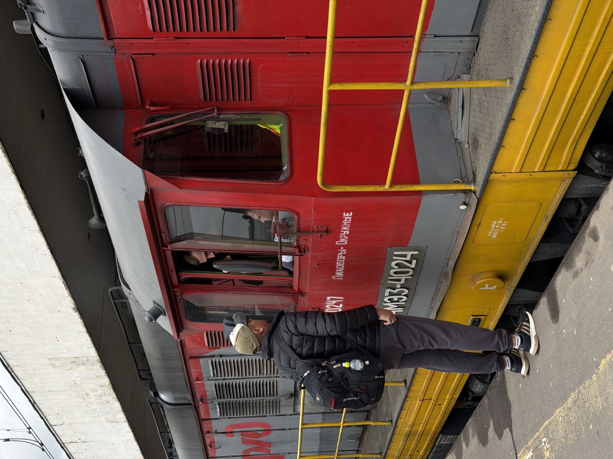 Morning commuter activity observed at Moscow train station and streets