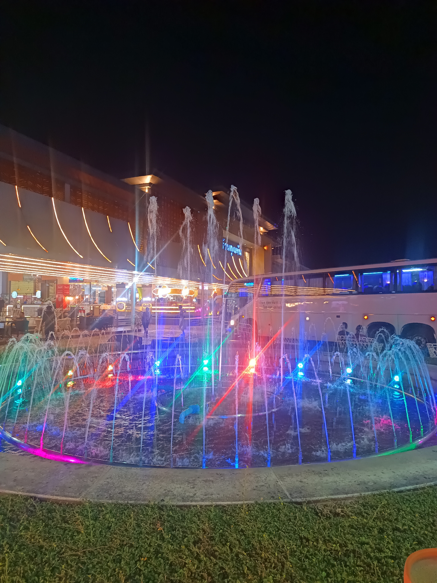 Colorful fountain and tree lighting display observed in Thap Sakae