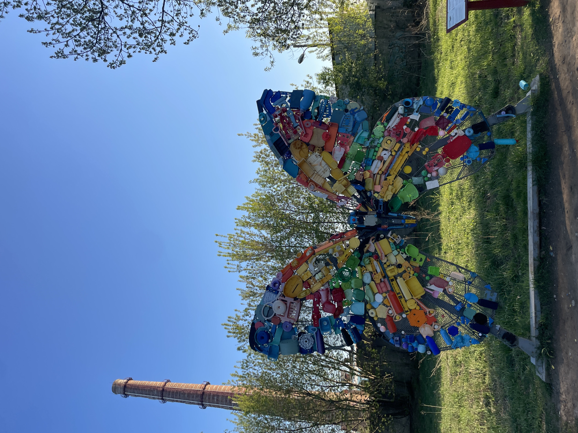 Spring forest walk documented in Kazan includes recycled butterfly sculpture