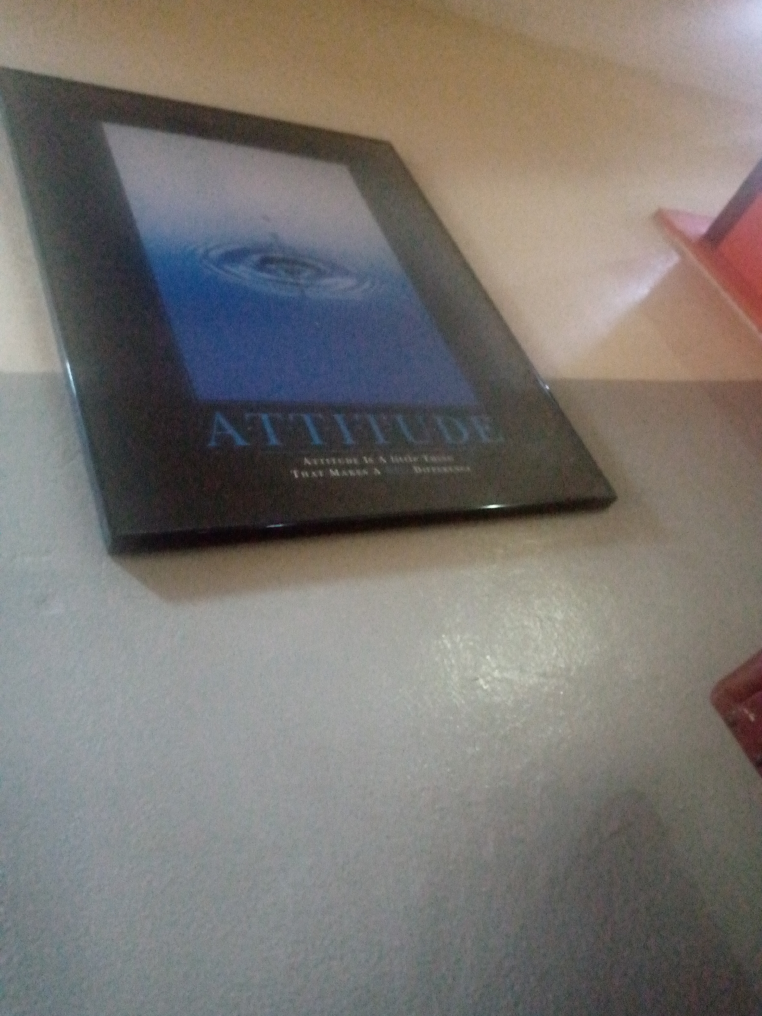Motivational posters spotted leaning against surfaces at unknown location