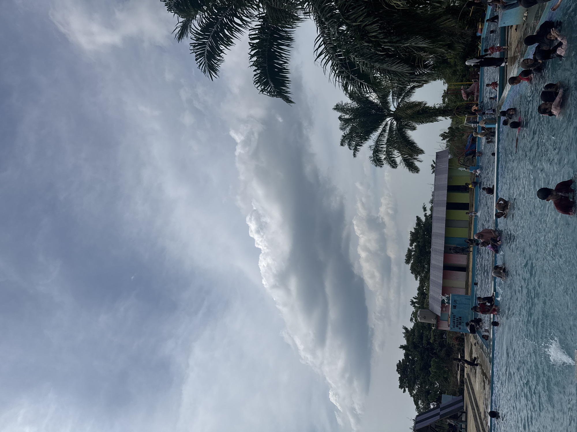 Crowded tropical pool day in Indonesia