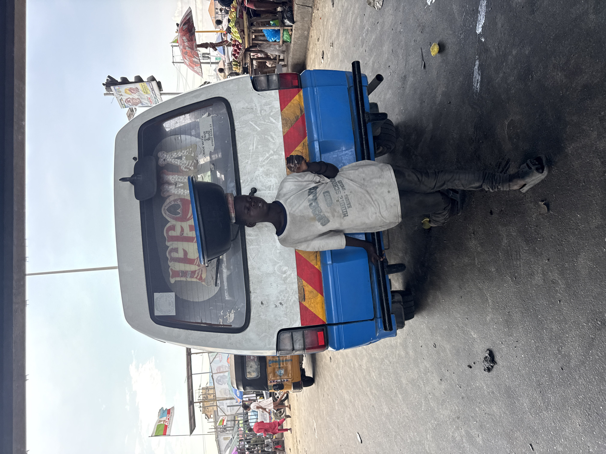 Lekki street life pushes on through heavy flooding and market bustle