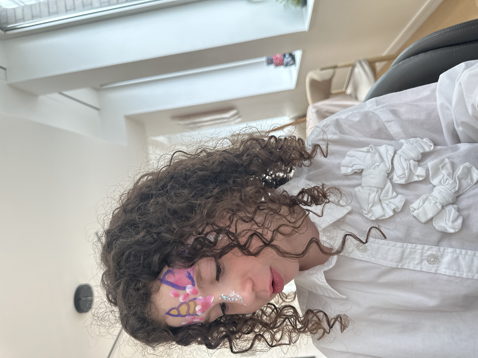 Family moments and face painting captured across NYC evening