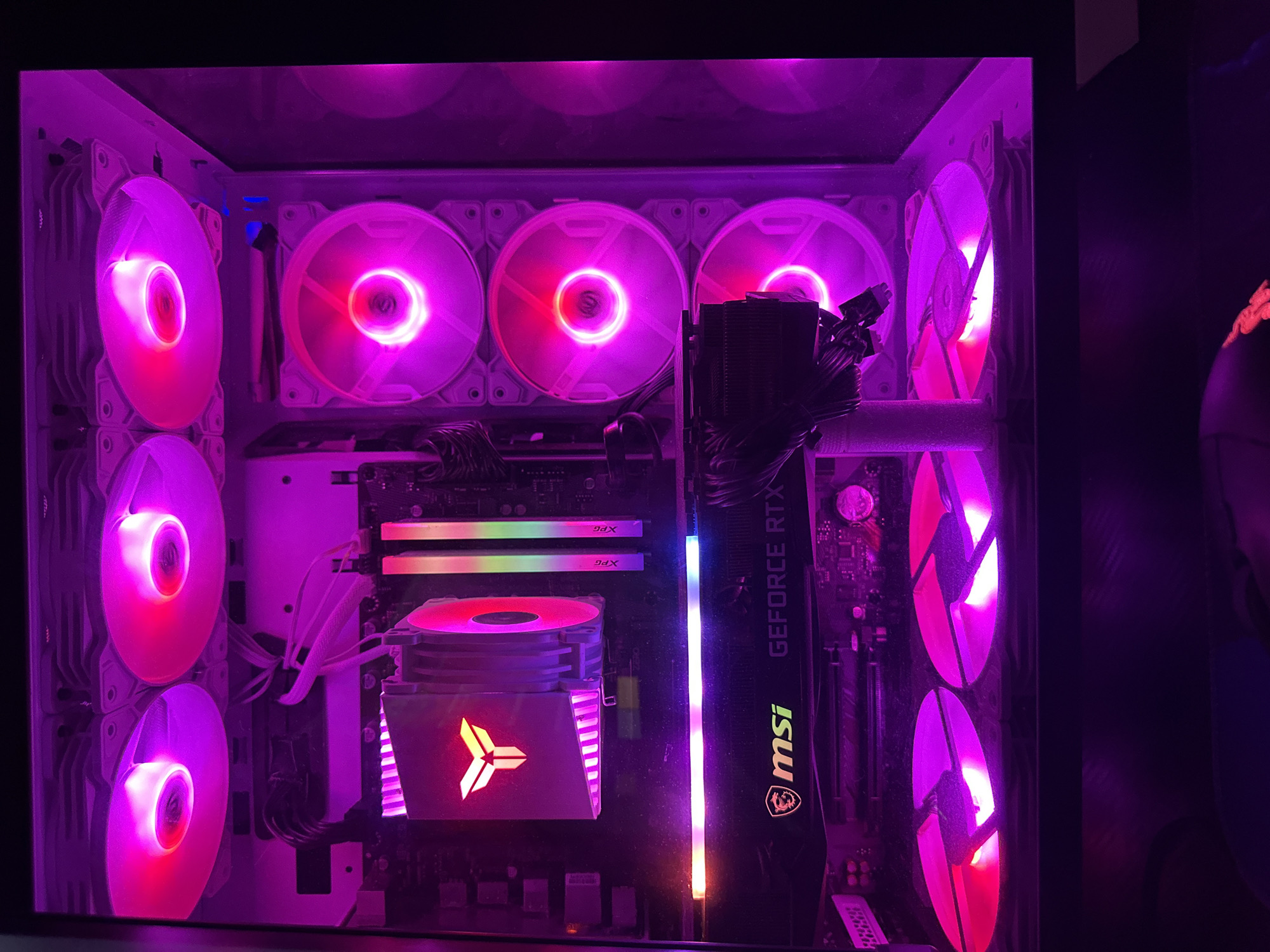 Custom RGB gaming PC build shown from multiple angles
