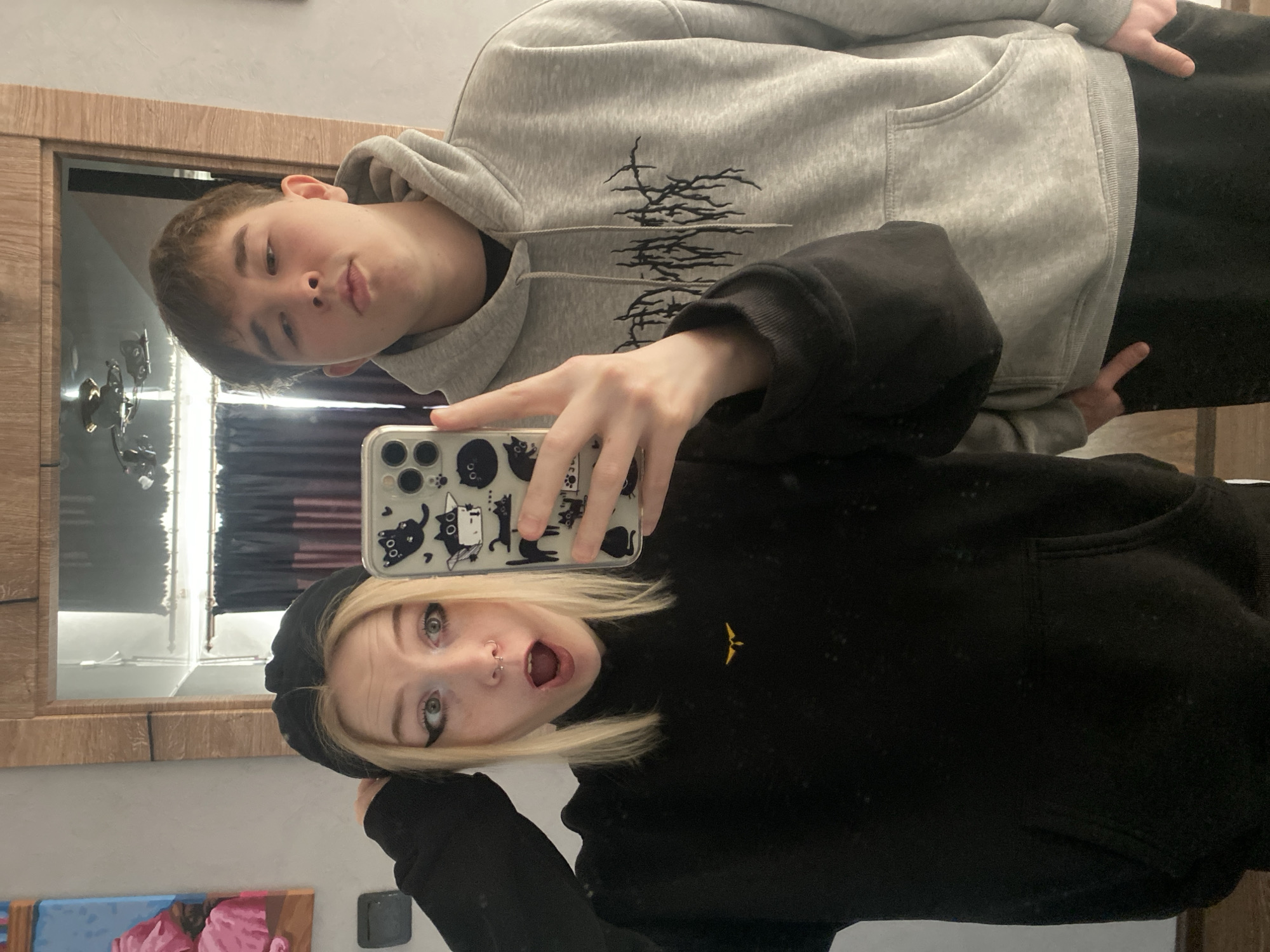Young pair takes selfies in Izhevsk apartment
