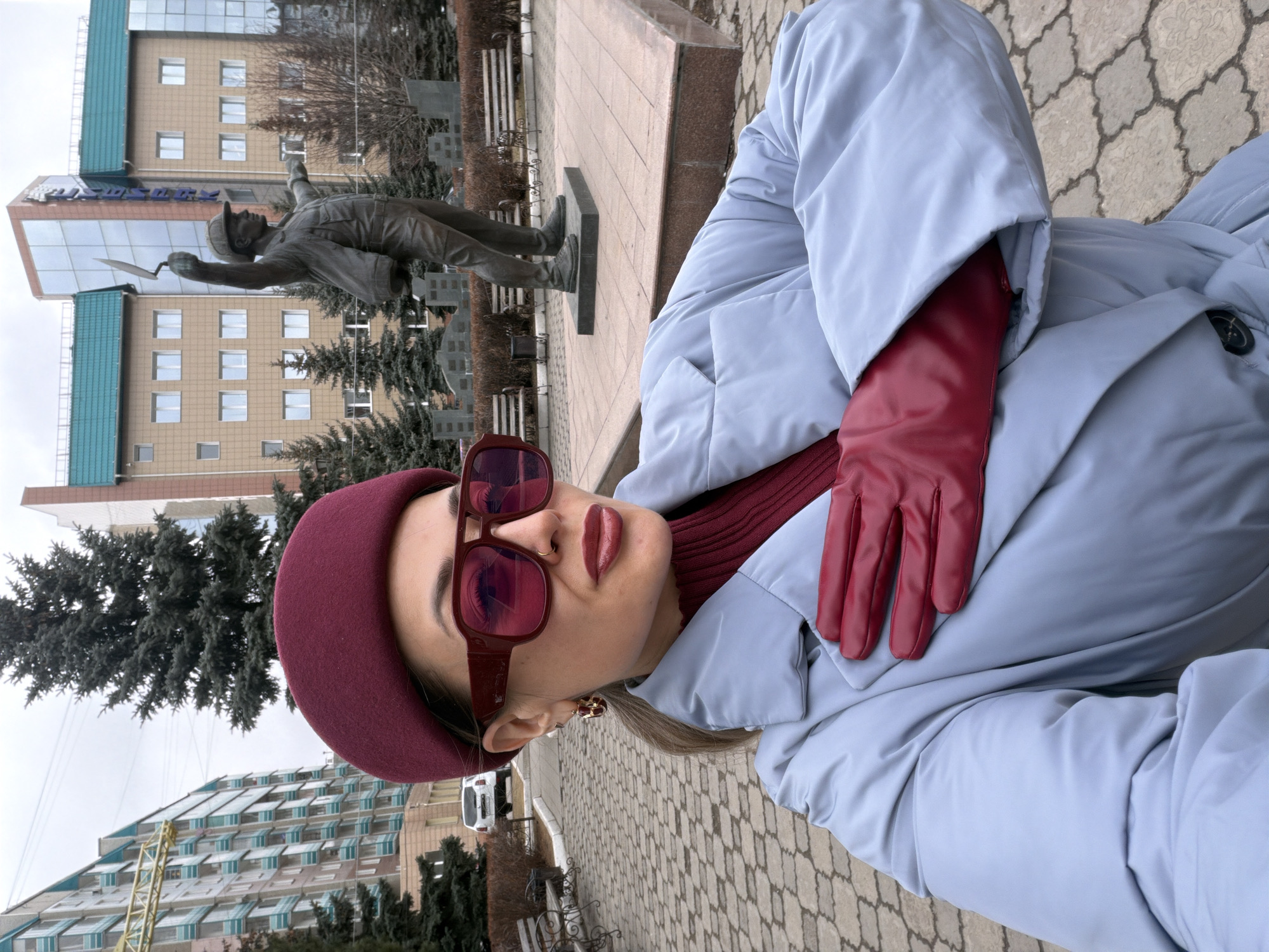 Woman poses for street photo in Krasnoyarsk, Russia