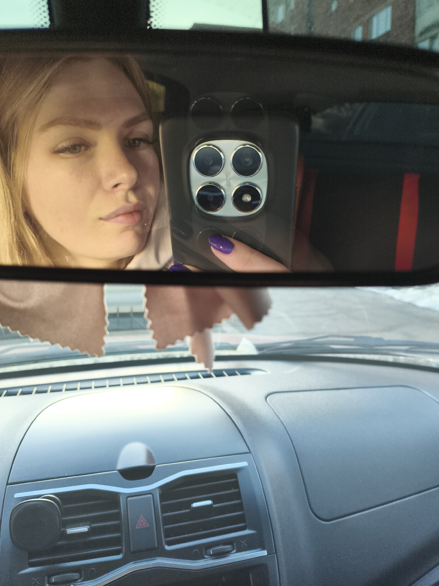 Quiet moments: mirror selfie and sky watching captured simultaneously
