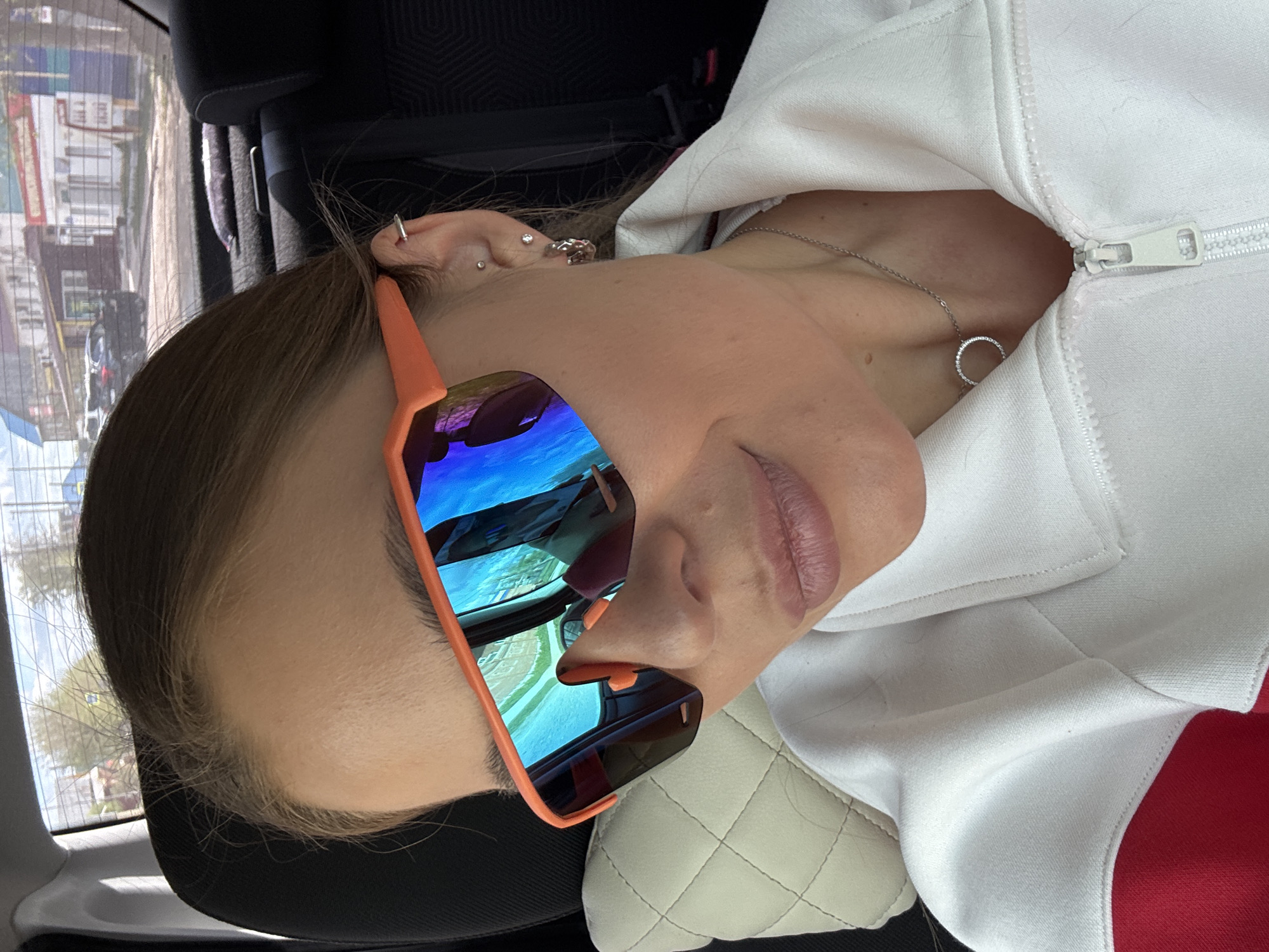 Woman spotted in car wearing sunglasses in Chernushka, Russia