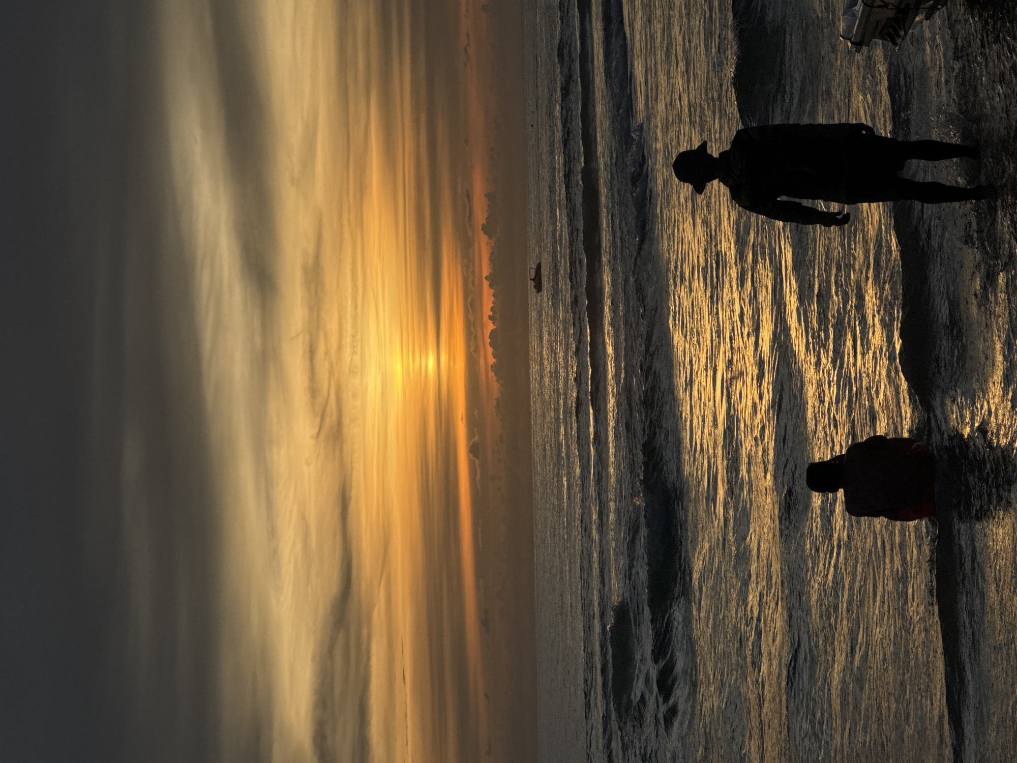 Karon Beach wraps up a busy day at golden hour