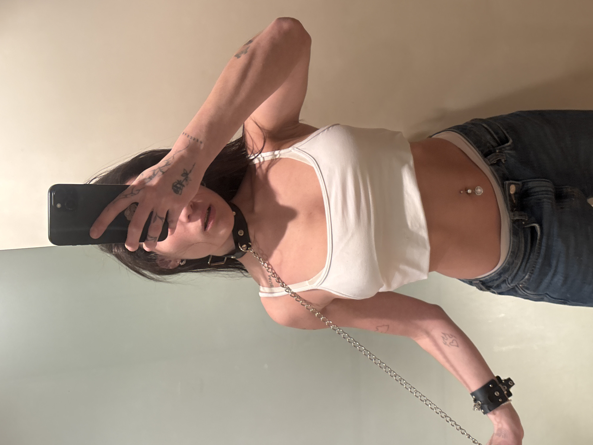 Woman takes mirror selfie in Buenos Aires apartment