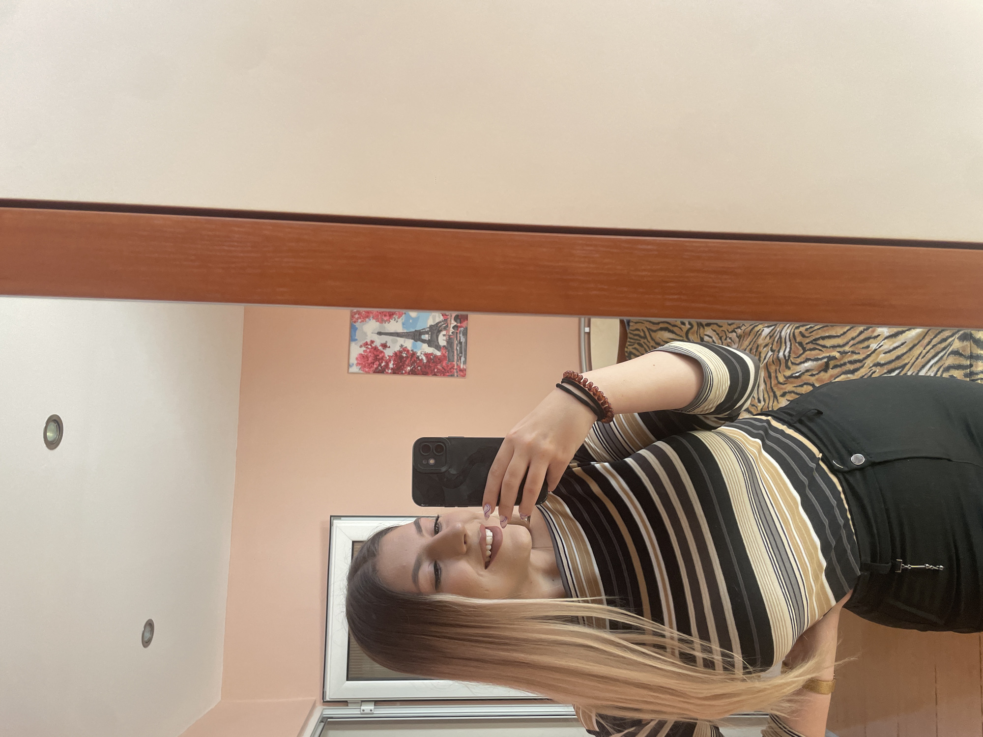 Woman takes mirror selfie in Burgas, Bulgaria