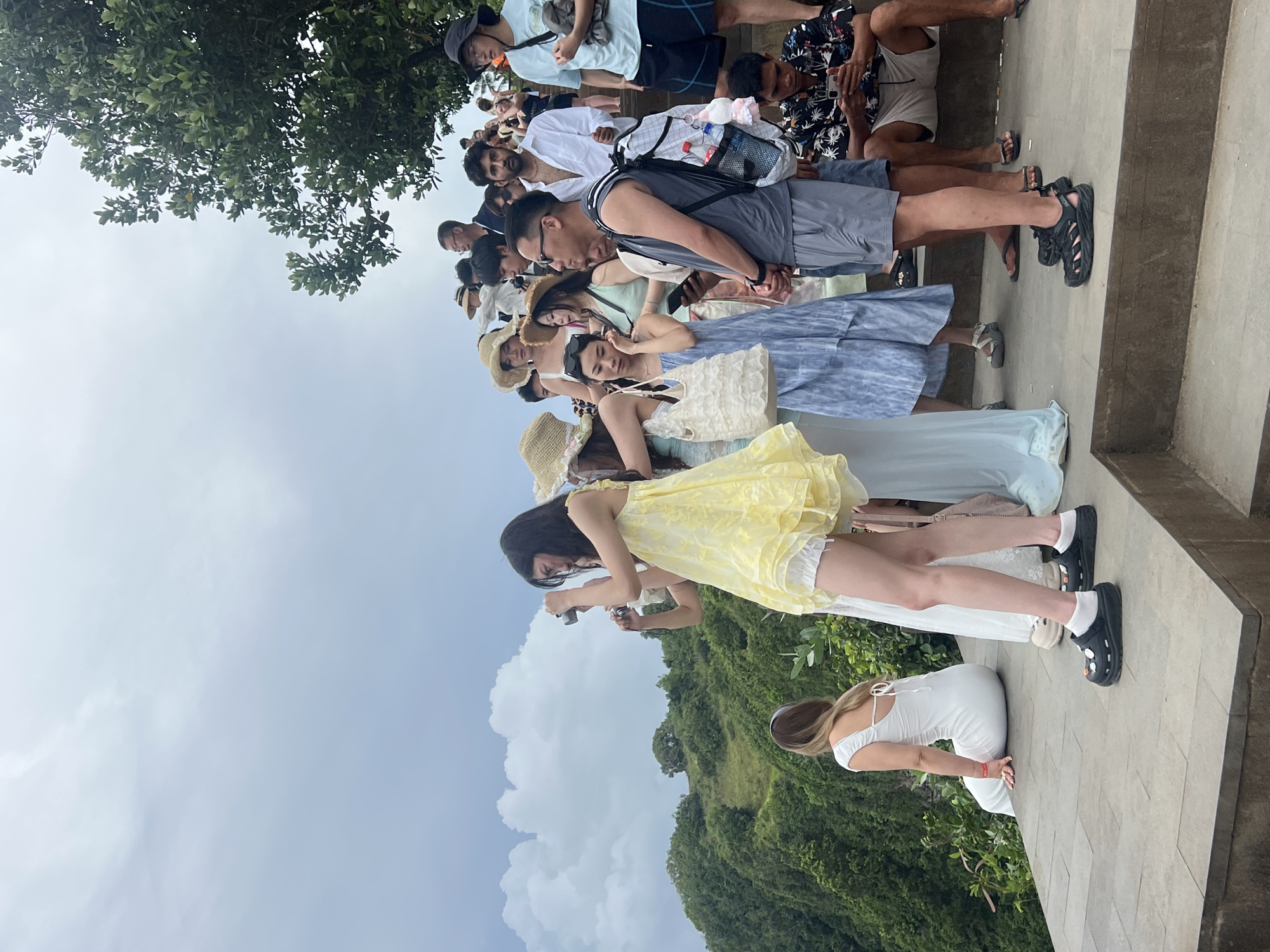 Tourists gather at iconic Kelingking Beach viewpoint in Nusa Penida