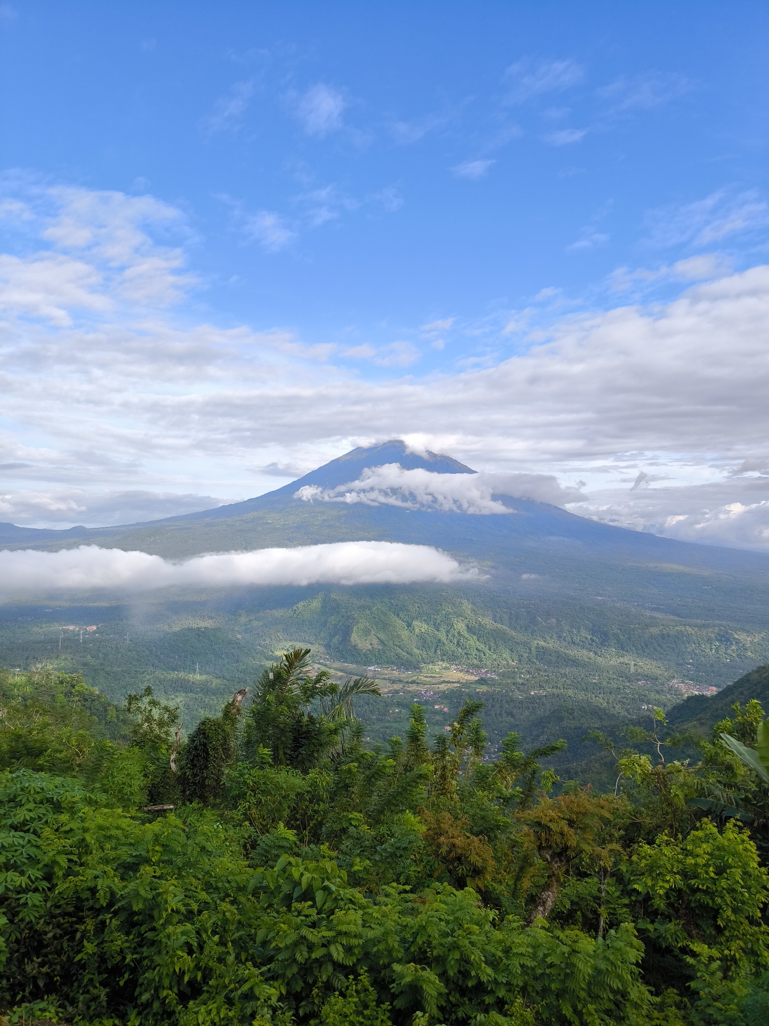 Construction work continues amid cloudy mountain landscape in Abang