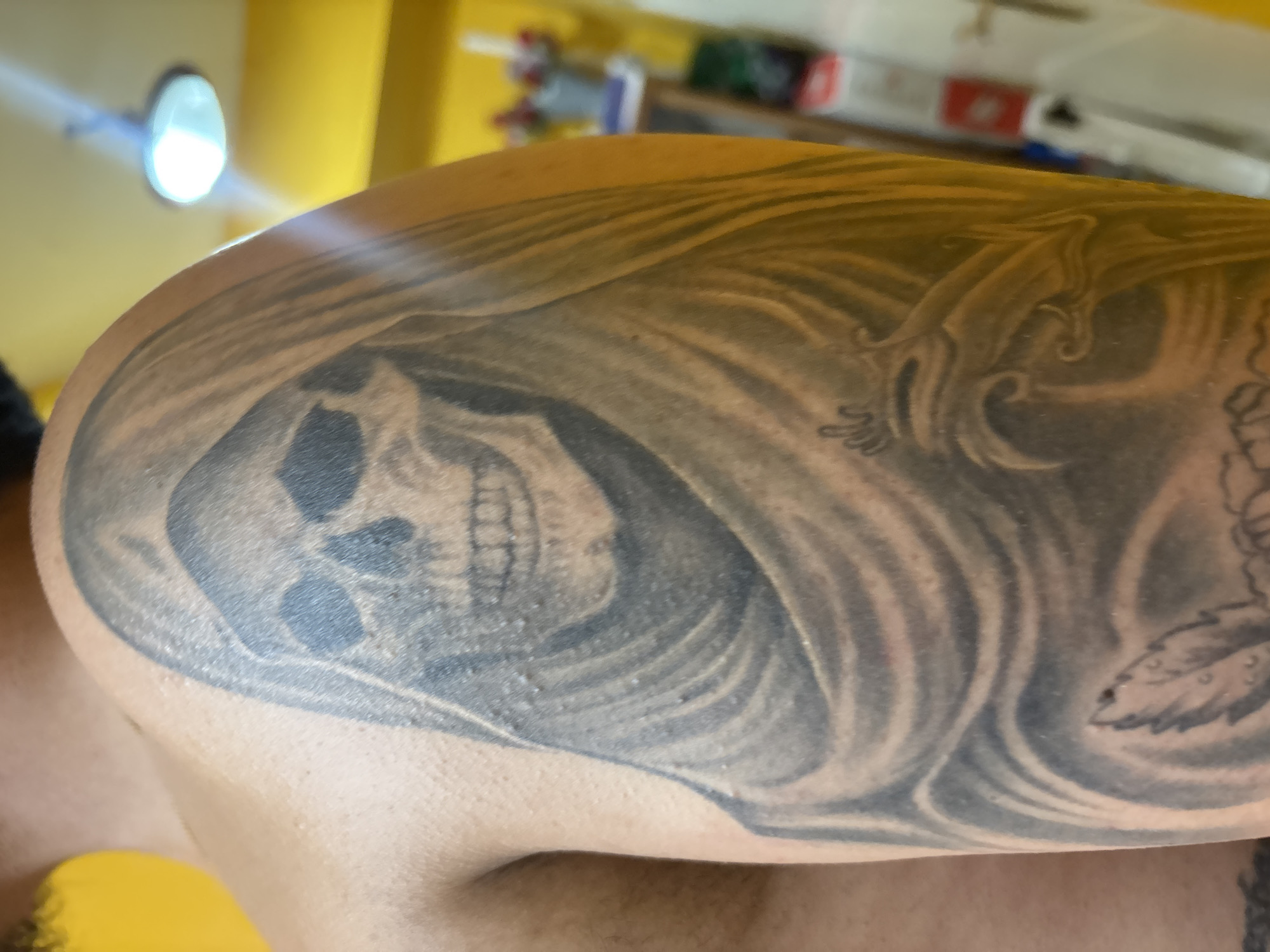 Tattoos, a sleepy dog, and Bad Bunny merch in Madrid