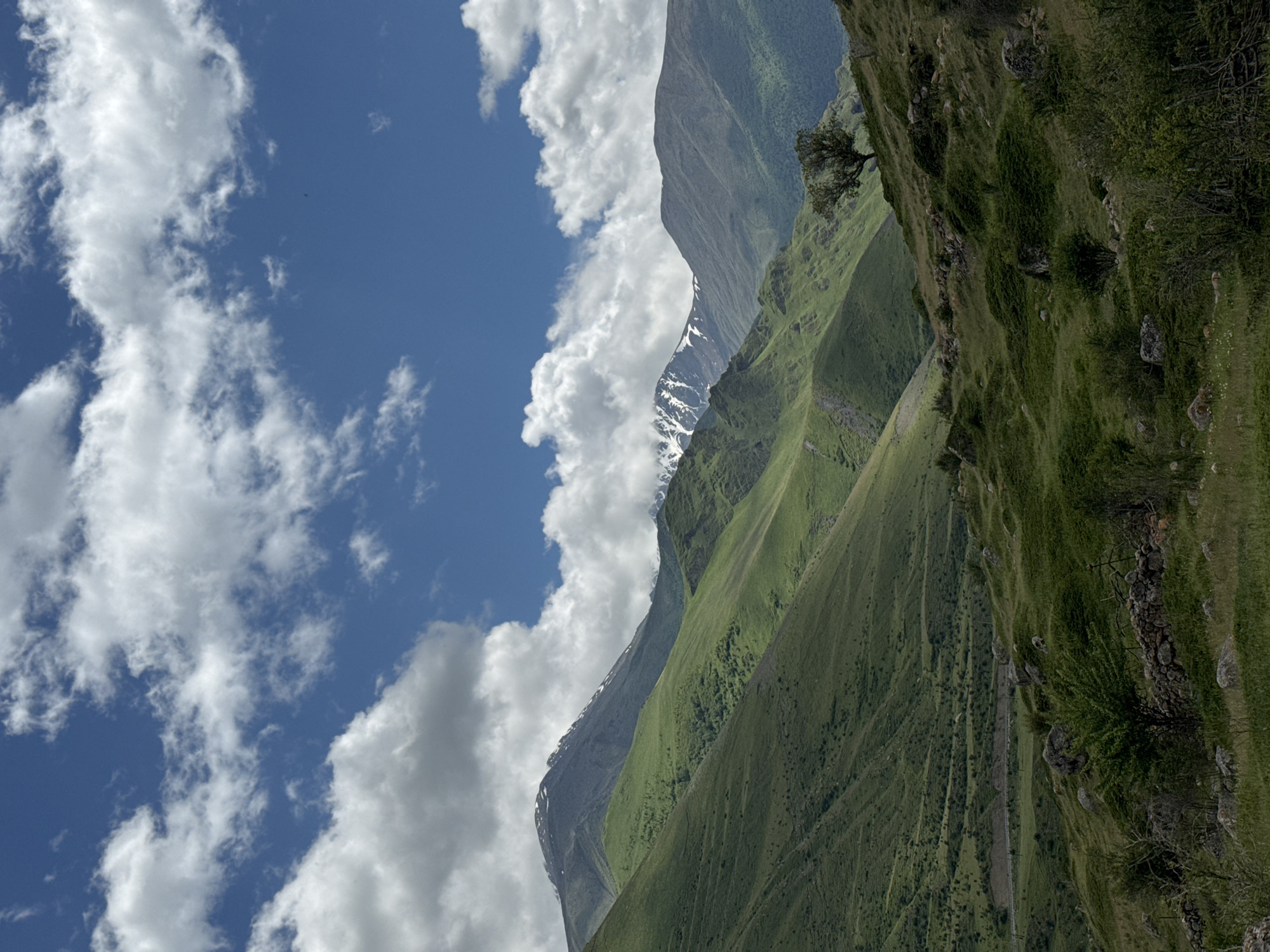 Ancient stone ruins and mountain peaks in El'tiubiu, Russia