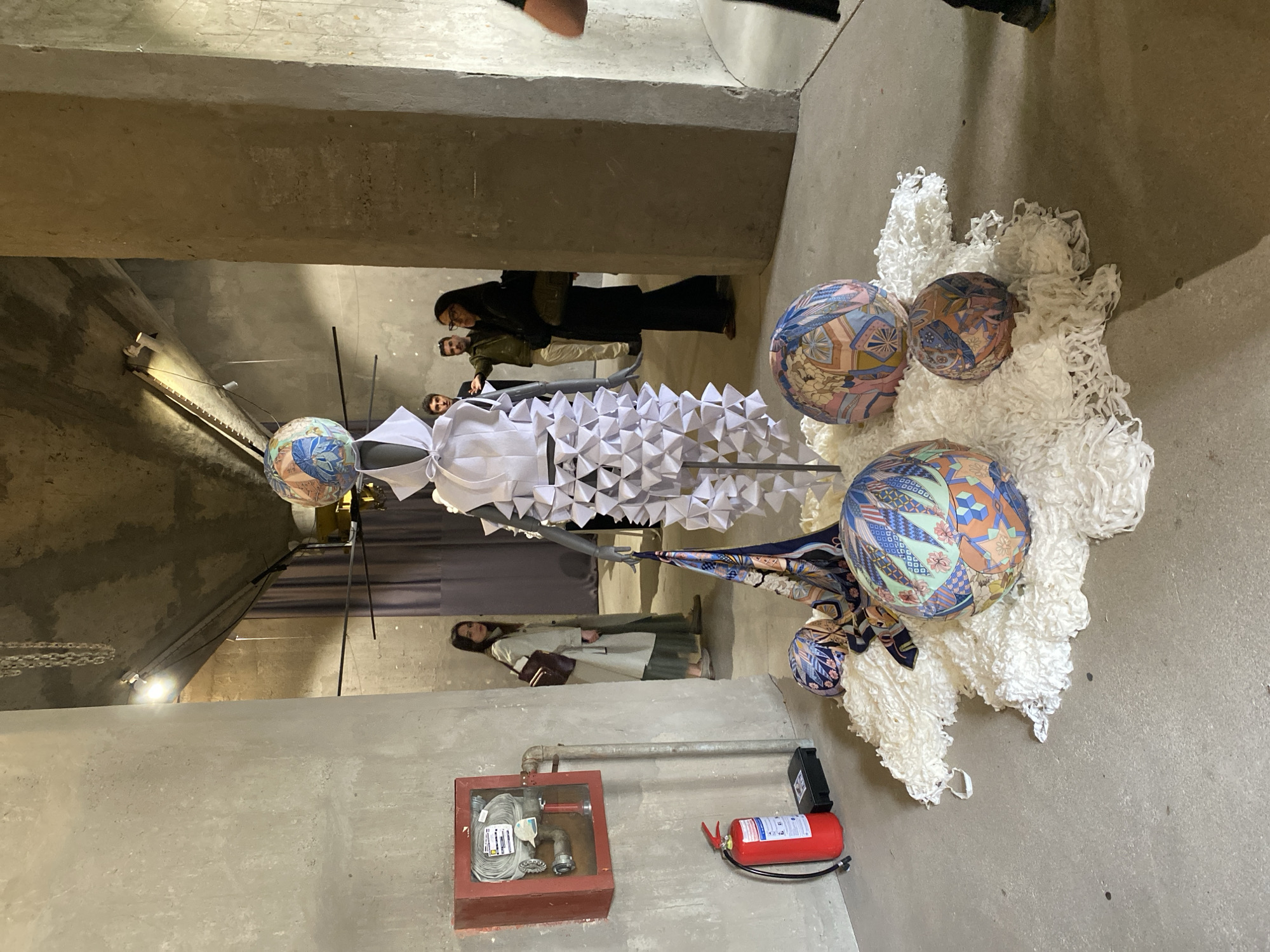 Art exhibition featuring installations and fashion displays in Belgrade