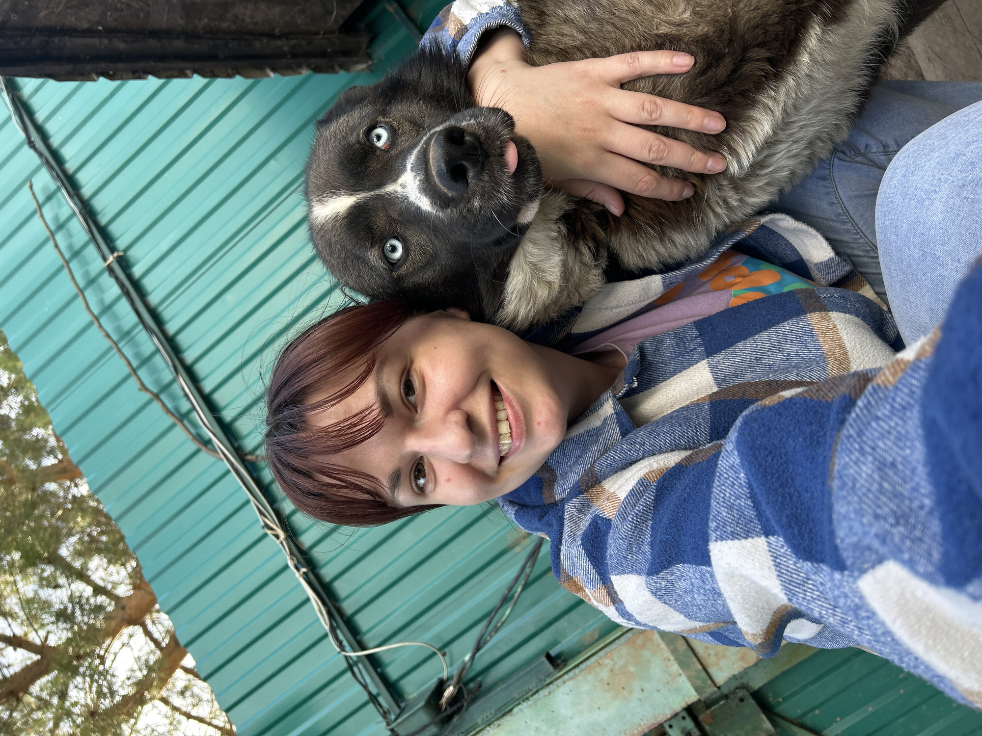 Person and dog enjoy afternoon photo session in Фоки, Russia