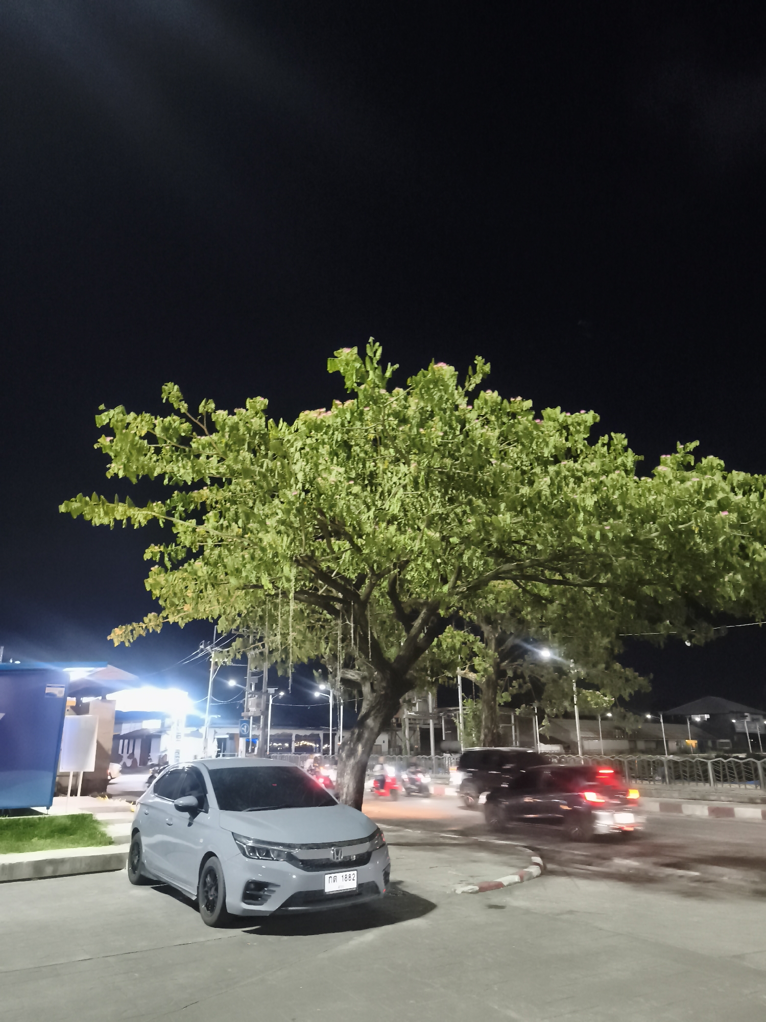Nighttime sports court activities captured in Thailand