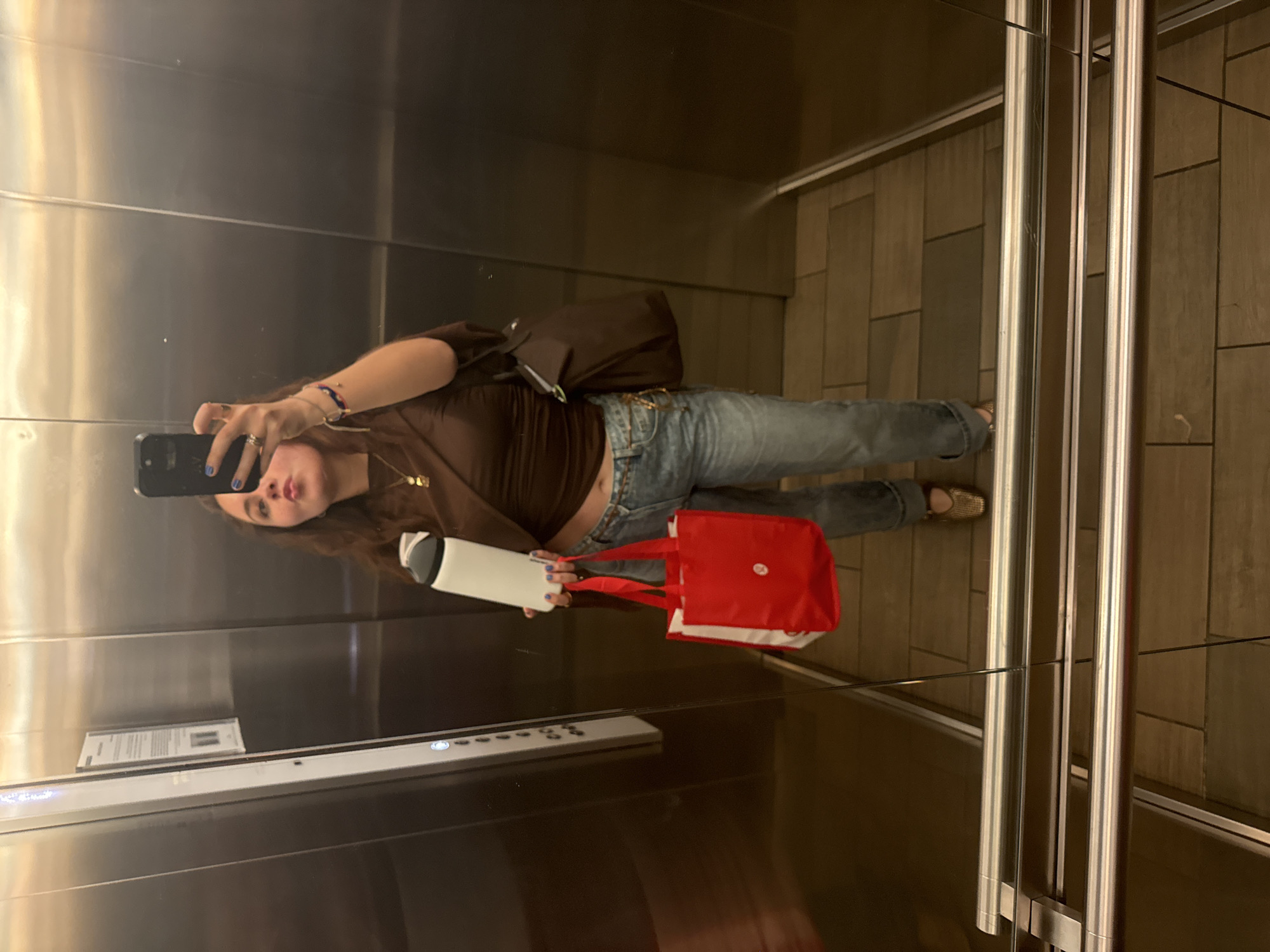 Woman takes elevator selfie in Mexico City