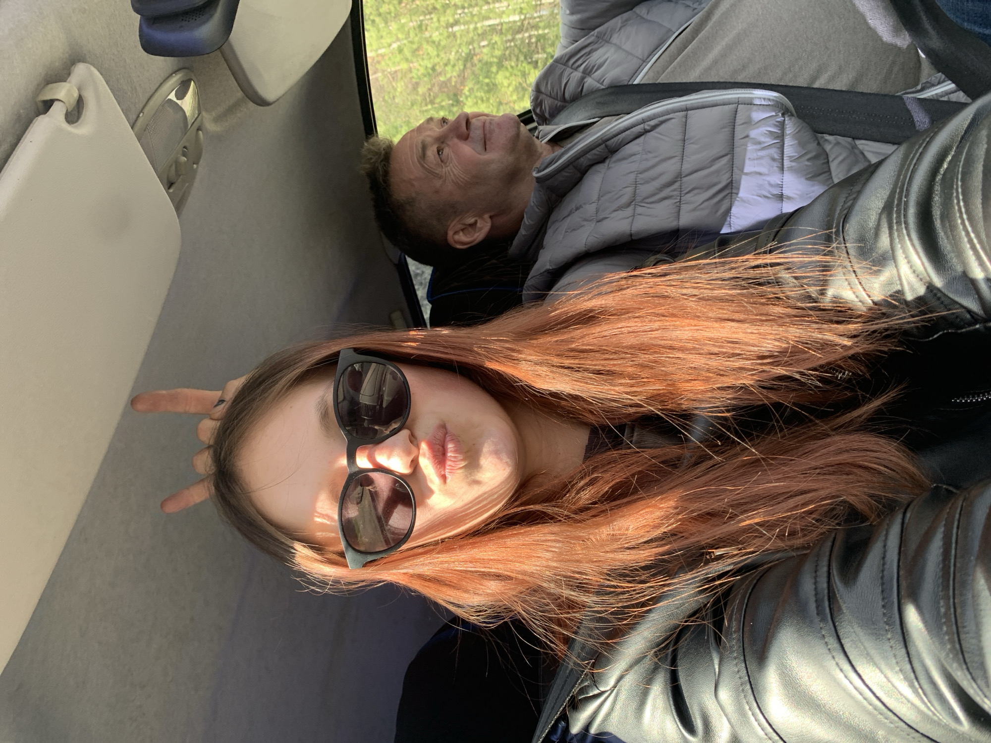Young people take selfies in vehicle, Chaikovsky Russia