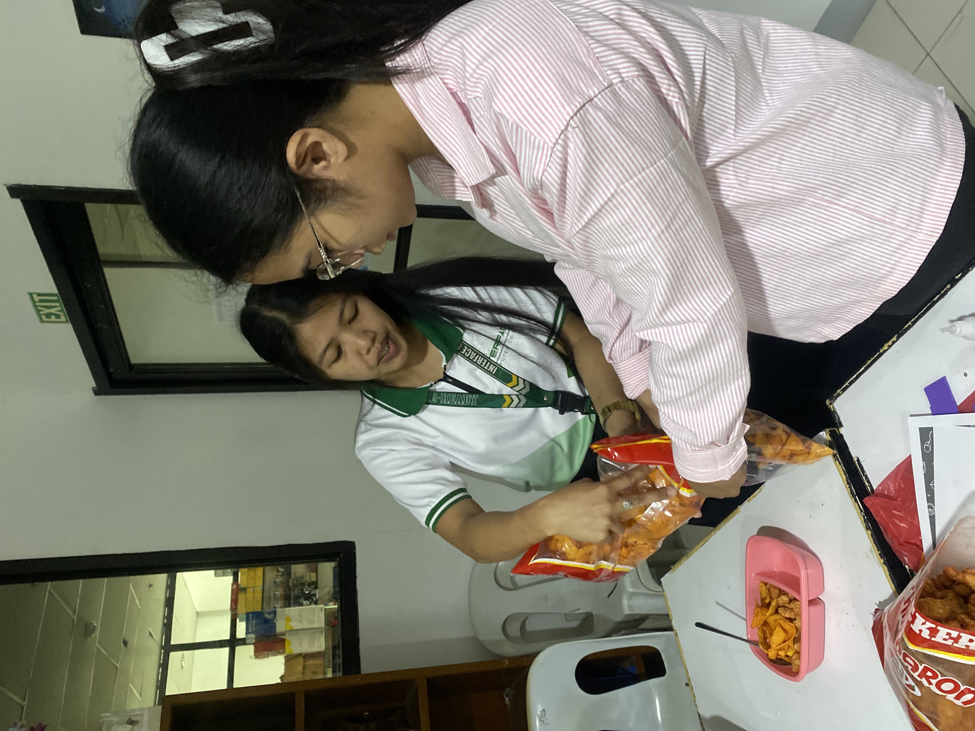 Davao students build miniature dioramas in a library setting