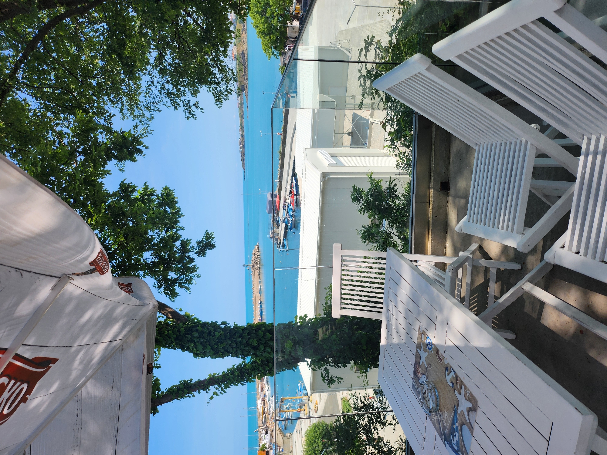 Summer morning scenes captured at Tsarevo harbor restaurants