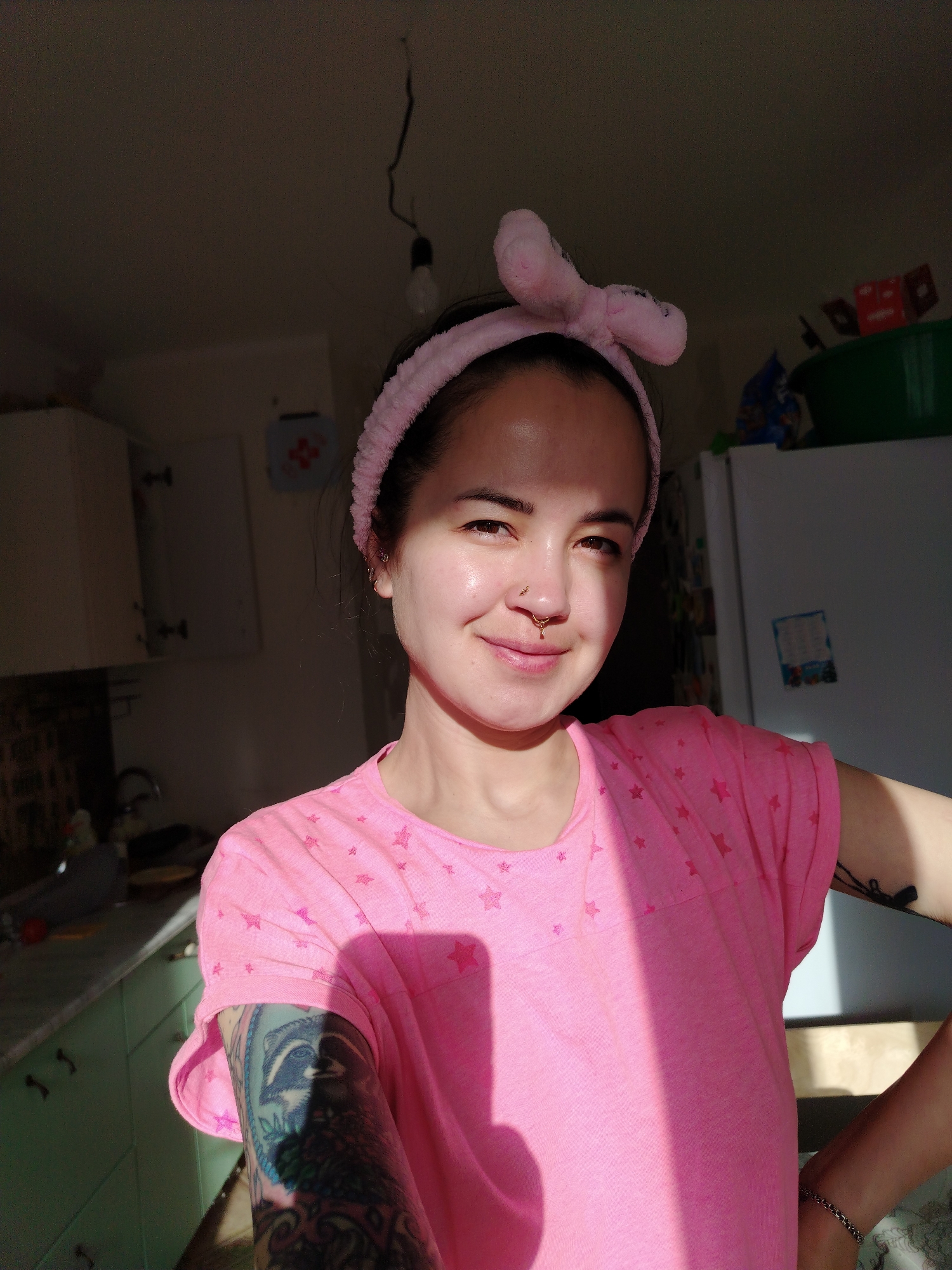 Woman takes late-night kitchen selfies in Noviy, Russia