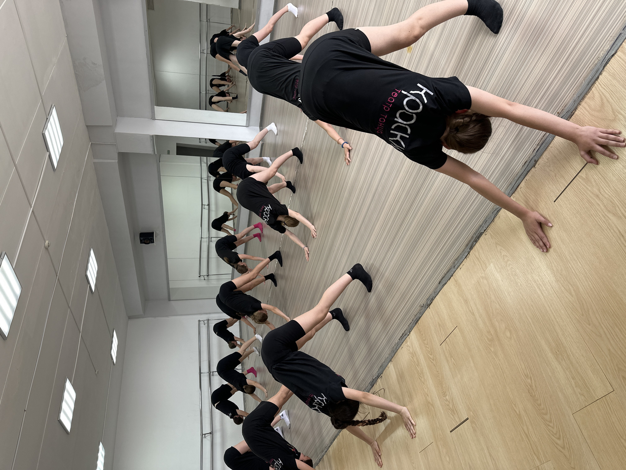 Youth dance class practices synchronized routine in Votkinsk studio