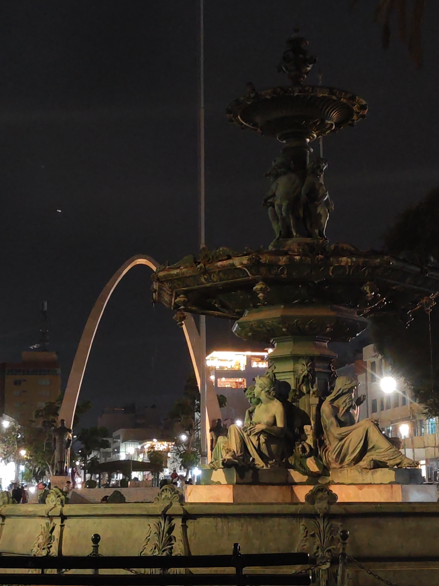 Nighttime scenes captured in Tacna include fountain and ramen packaging
