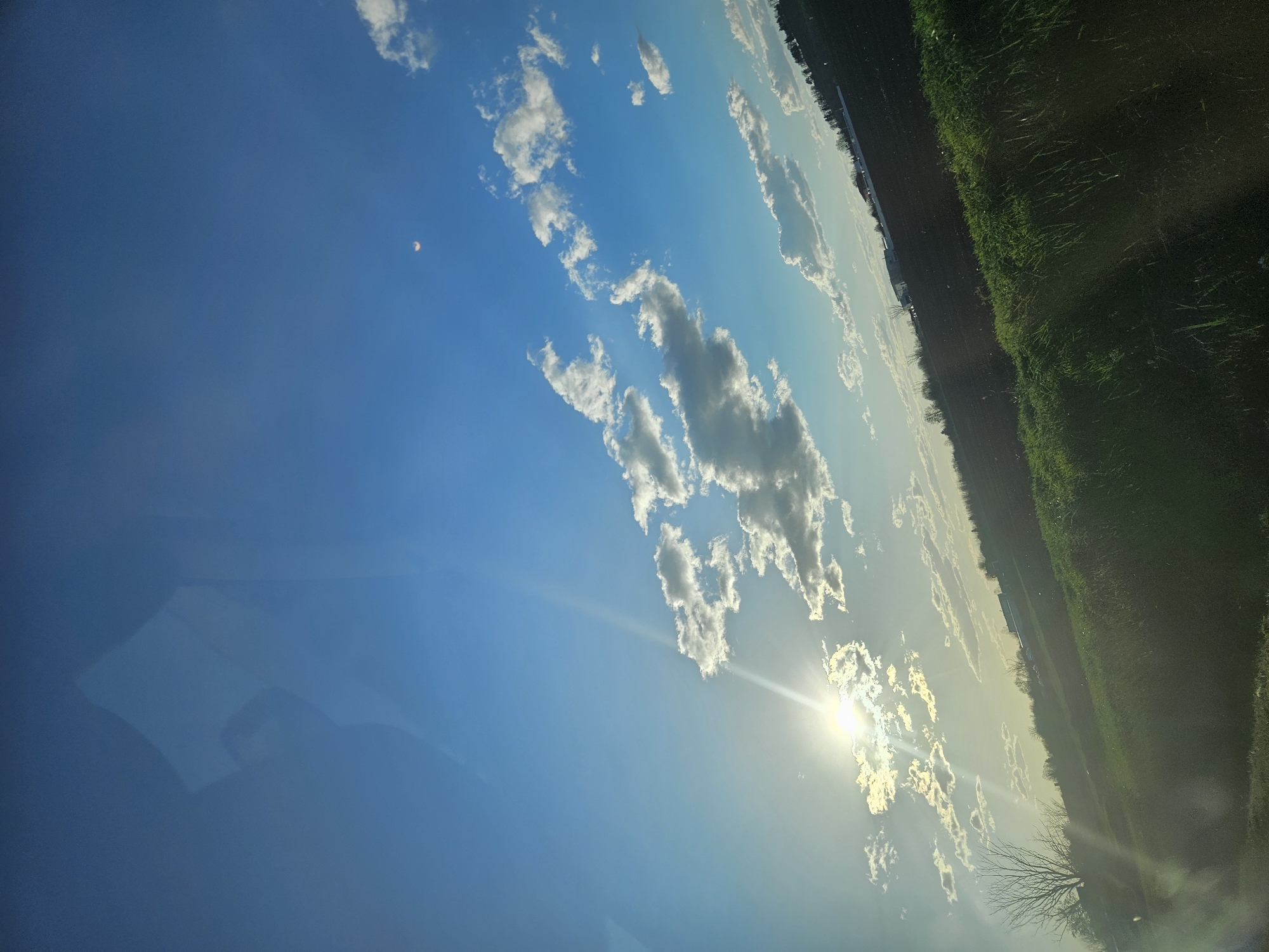 Clear blue skies with scattered clouds observed in Yambol