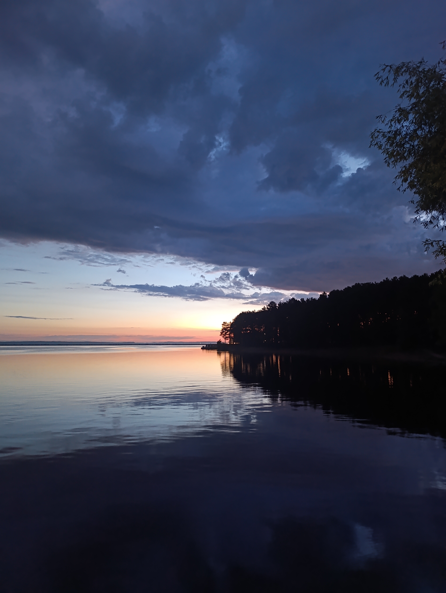 Twilight landscape captured over large body of water