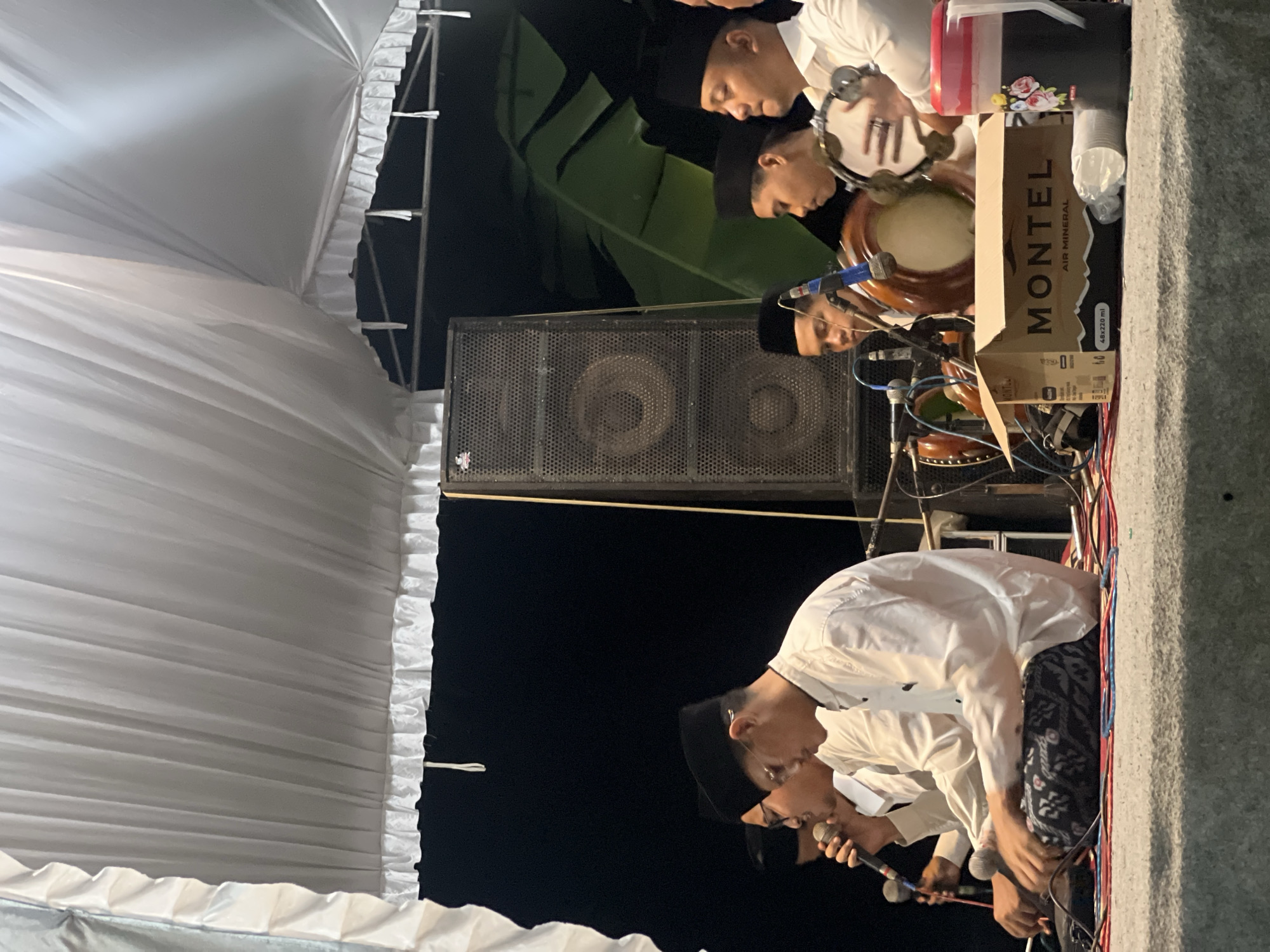 Traditional Indonesian musical performance draws community gathering in Wedarijaksa