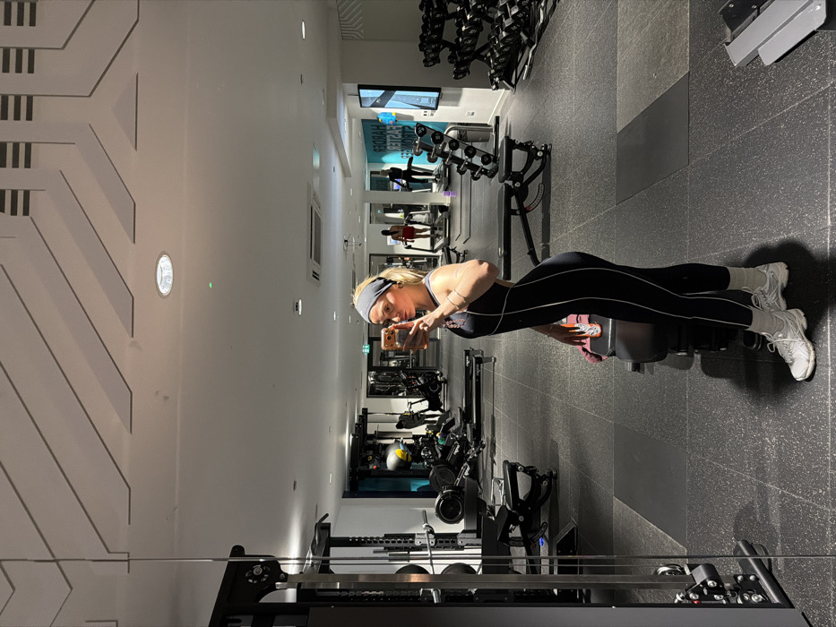 Woman takes gym selfies in Salford fitness center