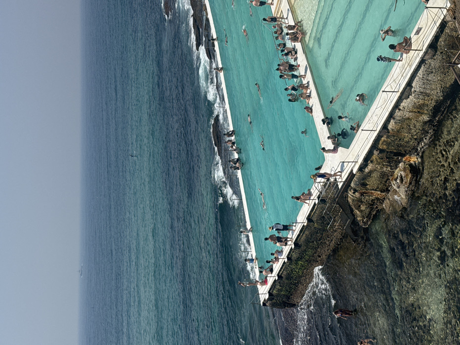 Late night activity captured at Bondi Beach pools and scooter area