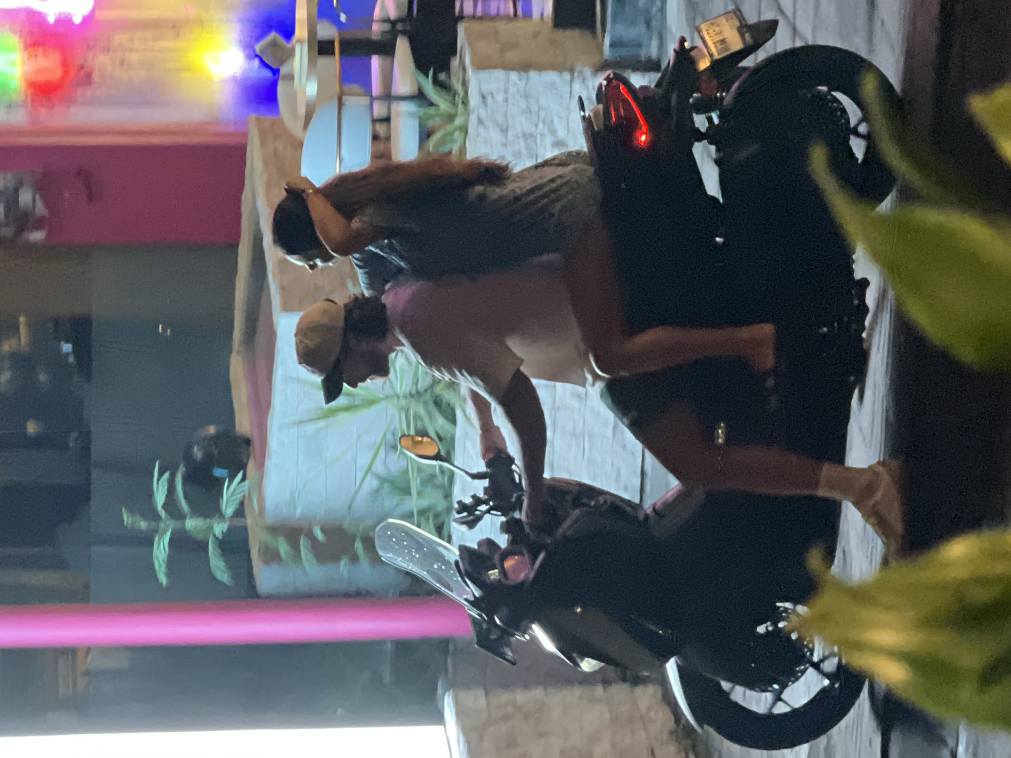 Evening street life documented around TROPI CANDY shop, North Kuta