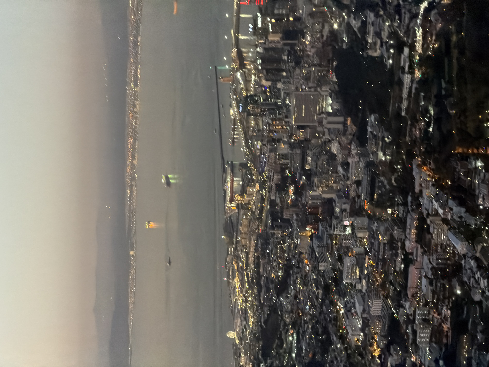 Aerial nighttime photograph captures panoramic Cape Town cityscape