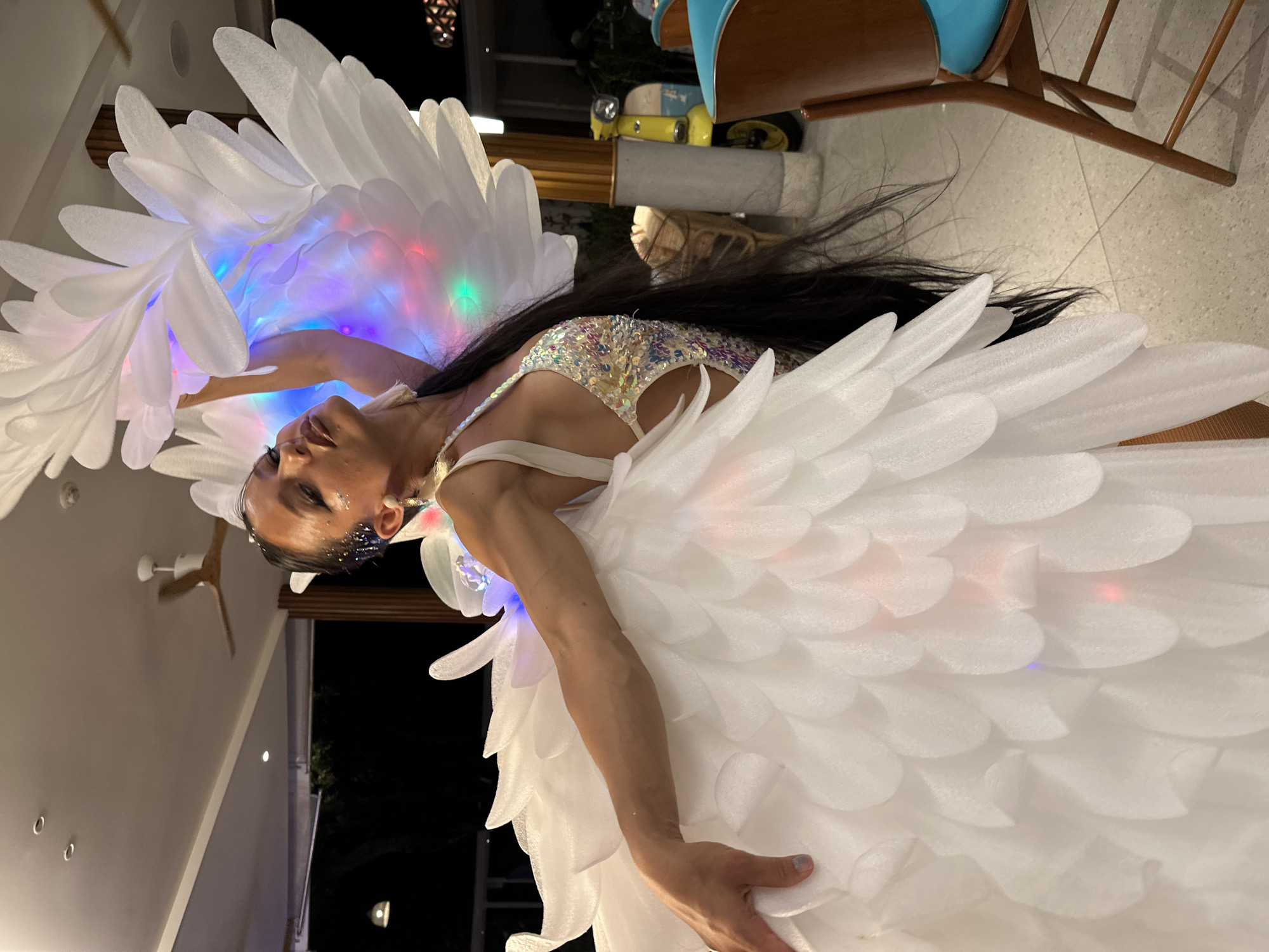 Illuminated angel costume on display in Ko Samui venue